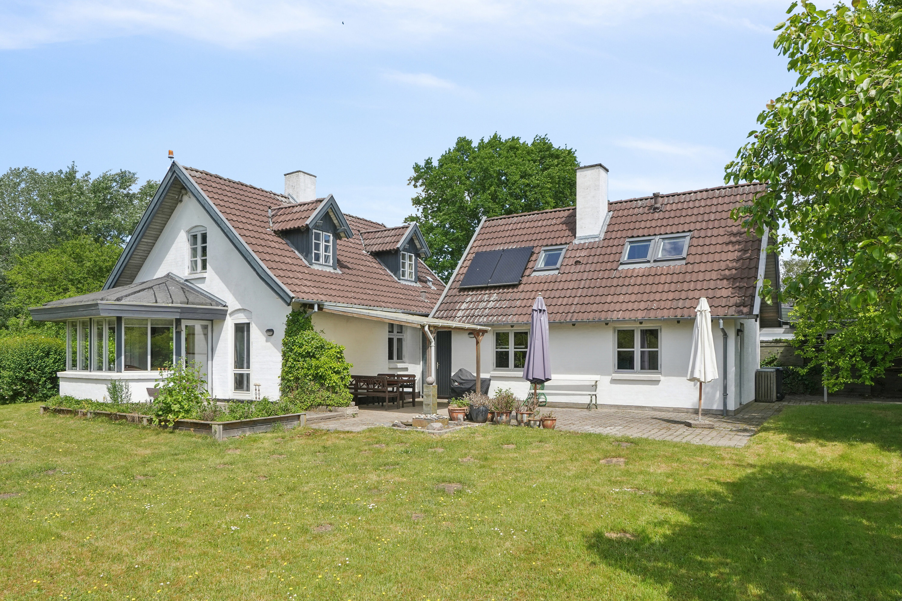 Fremhævet set fra haven billede i fuldskærmstilstand. Billede af Bogøvej 67, 5450 Otterup