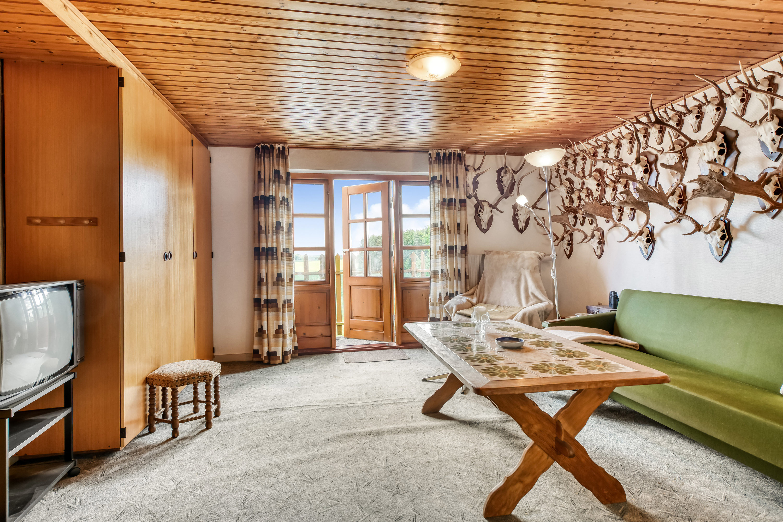 Fremhævet stue billede i fuldskærmstilstand. Billede af Gødsbølvej 69, Åst, 7184 Vandel