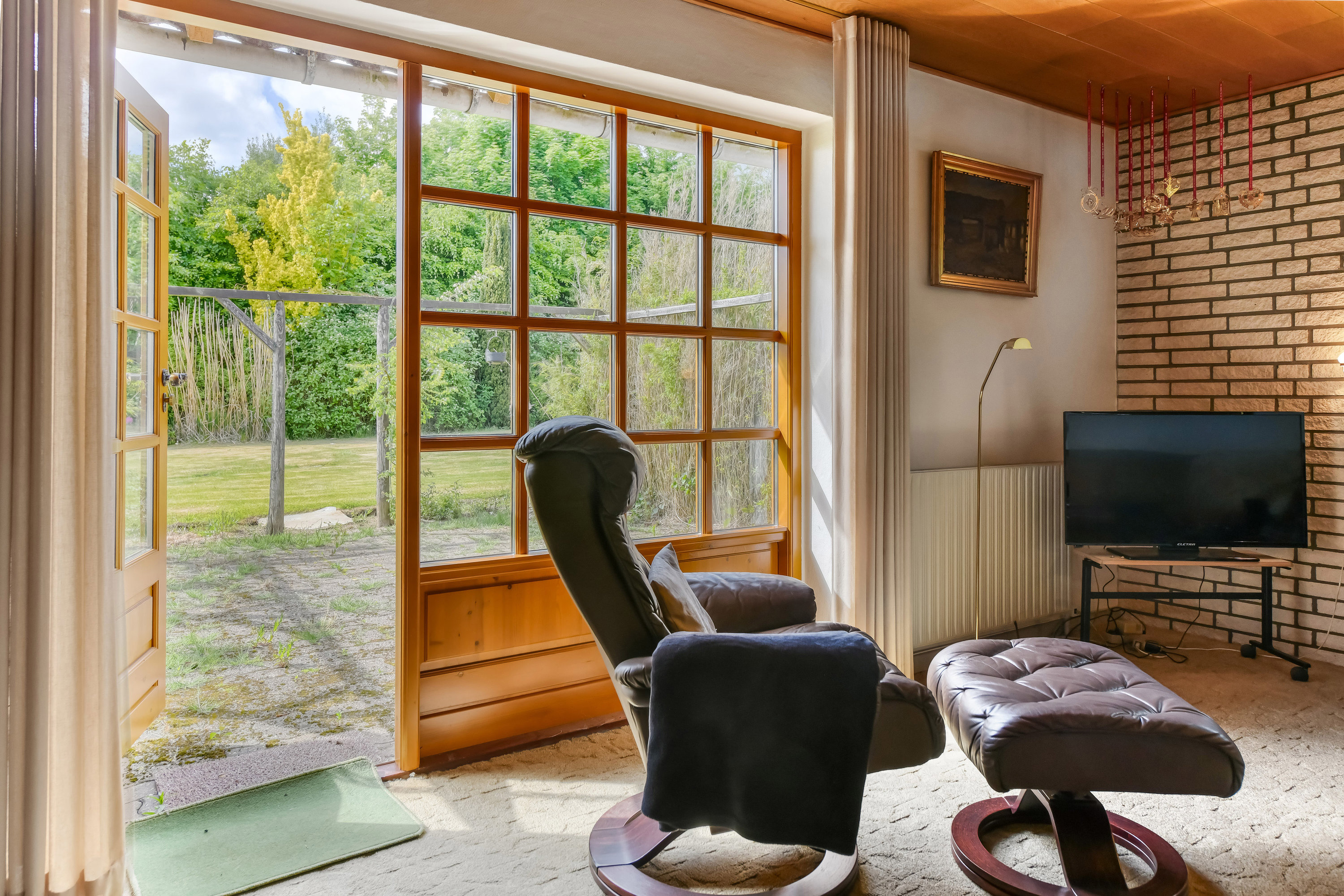 Fremhævet stue billede i fuldskærmstilstand. Billede af Gødsbølvej 69, Åst, 7184 Vandel