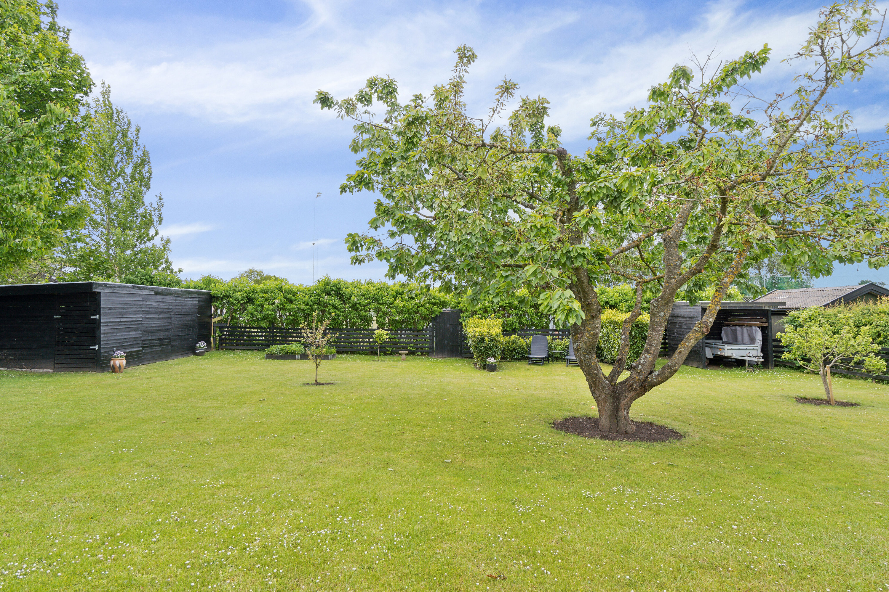 Fremhævet set fra haven billede i fuldskærmstilstand. Billede af Tollerupvej 33, 3370 Melby