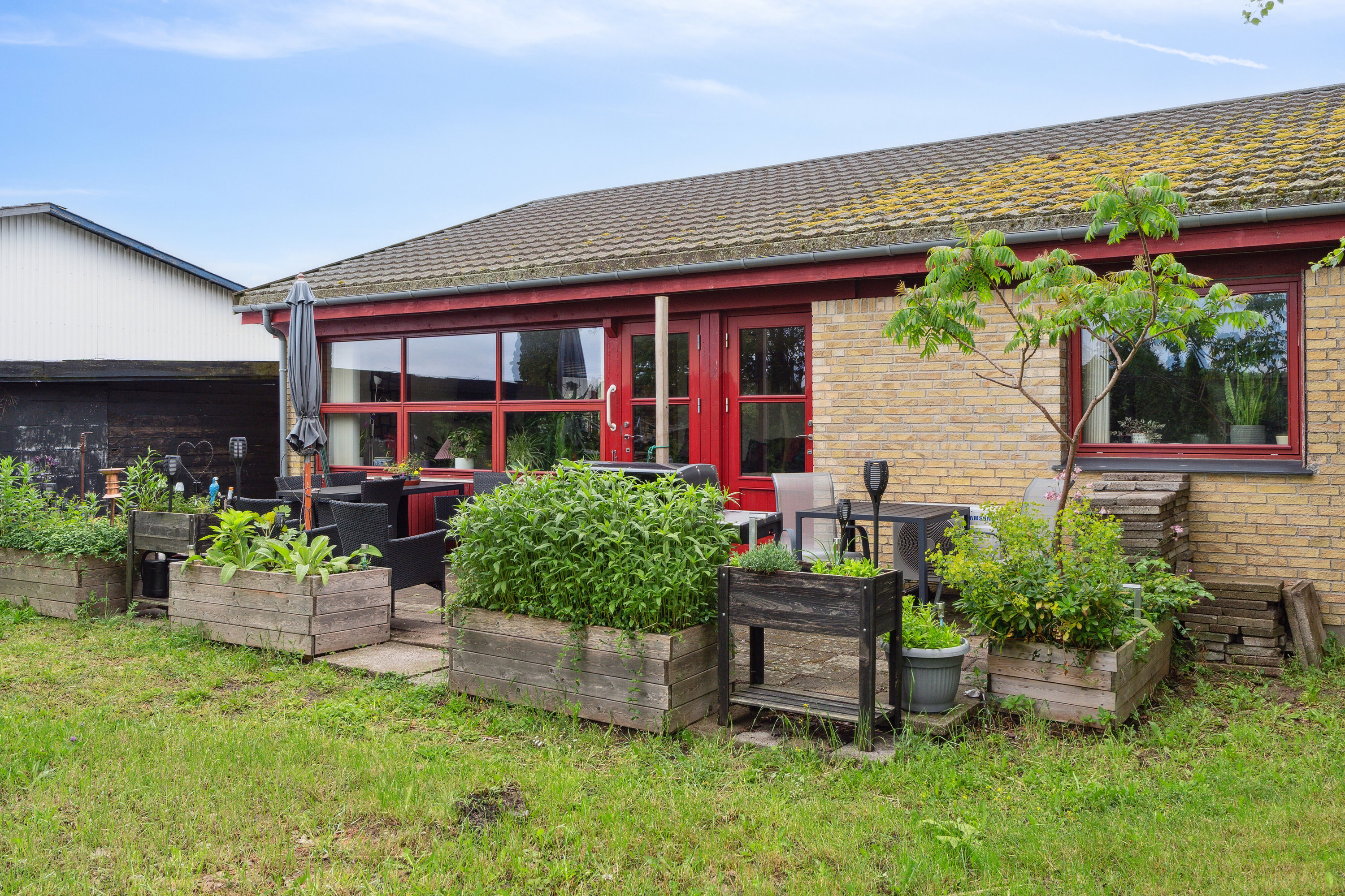 Fremhævet set fra haven billede i fuldskærmstilstand. Billede af Bøgevej 4, 4760 Vordingborg