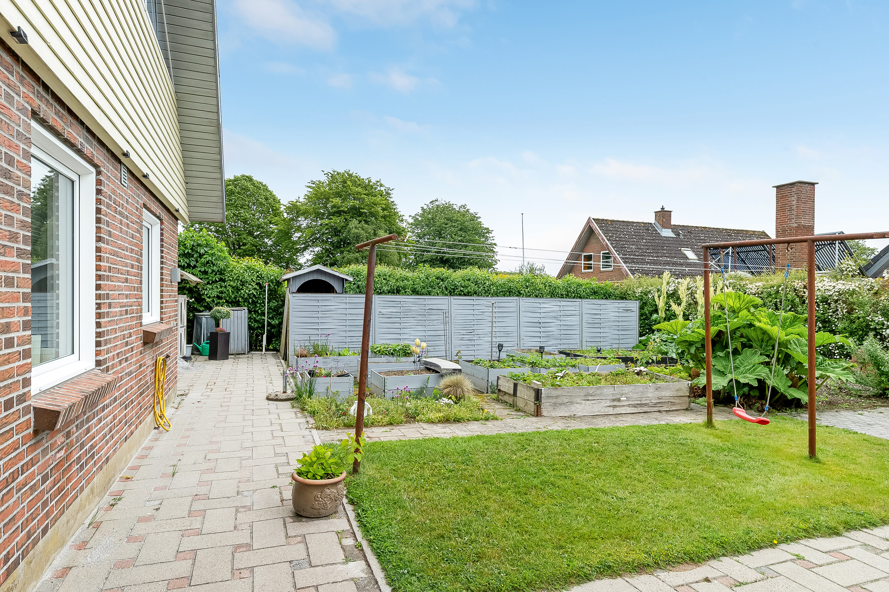 Fremhævet have billede i fuldskærmstilstand. Billede af J.A. Petersens Park 12, 6093 Sjølund