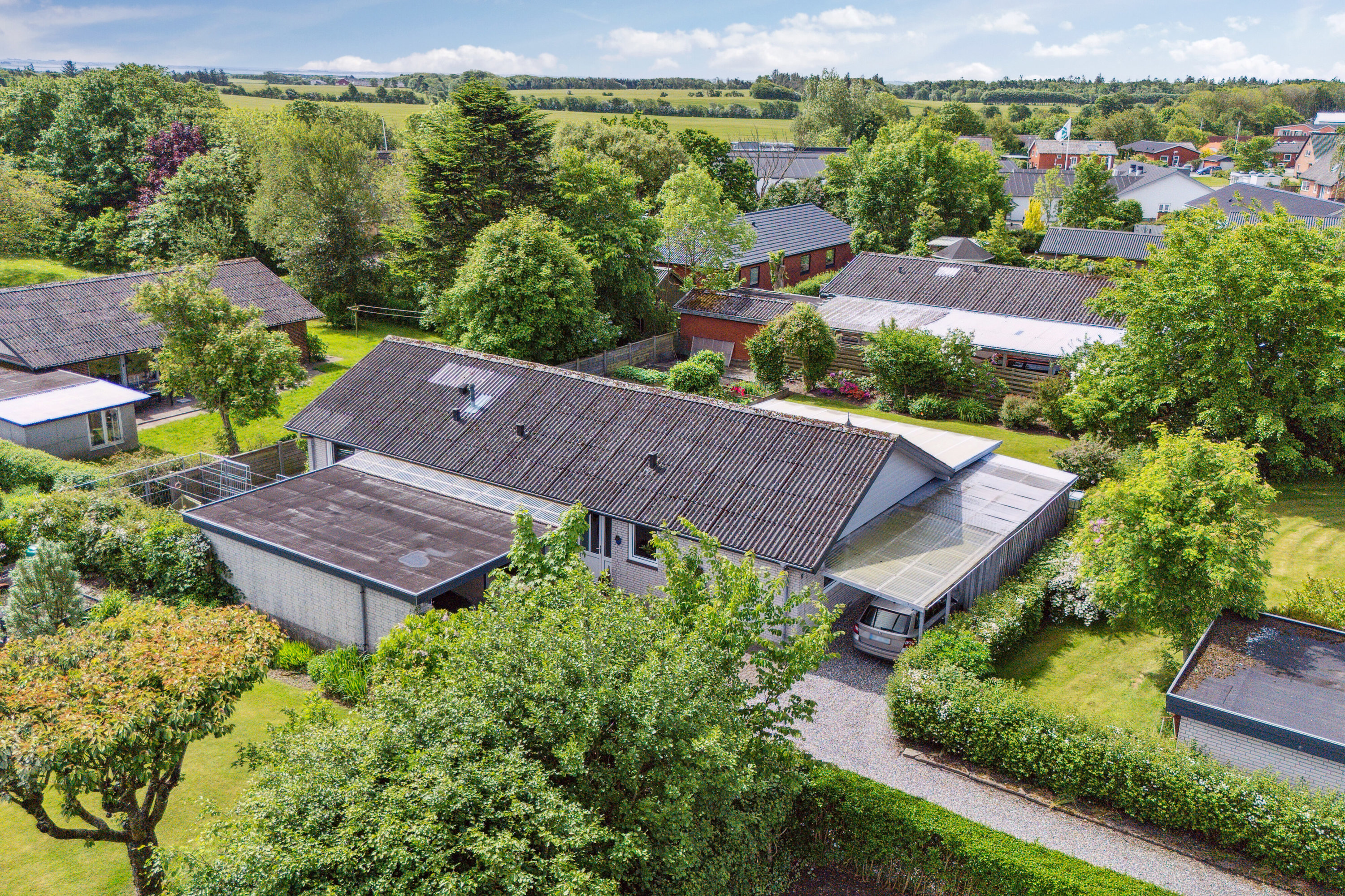 Fremhævet set fra haven billede i fuldskærmstilstand. Billede af Degnevænget 12, Koldby, 7752 Snedsted