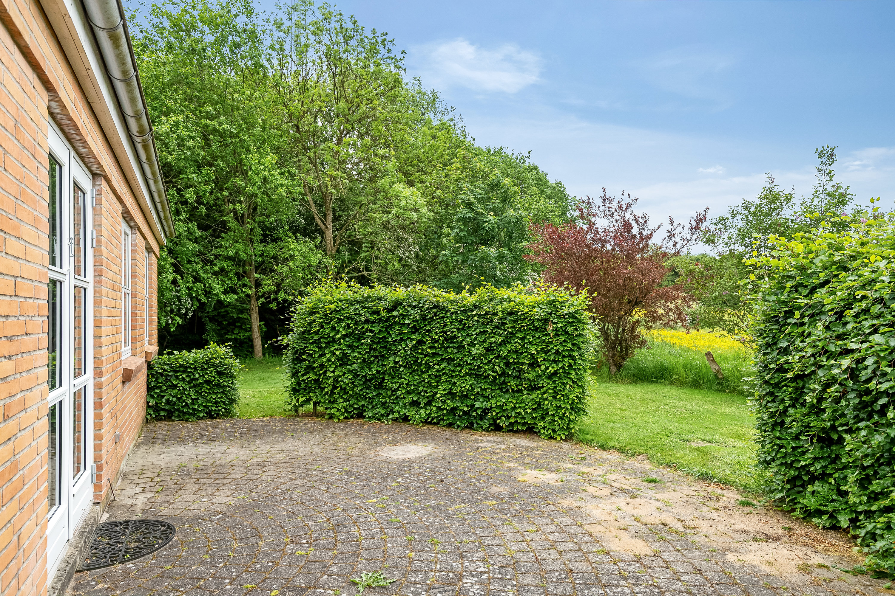 Fremhævet terrasse billede i fuldskærmstilstand. Billede af Vesterbyvej 9B, Ødsted, 7100 Vejle