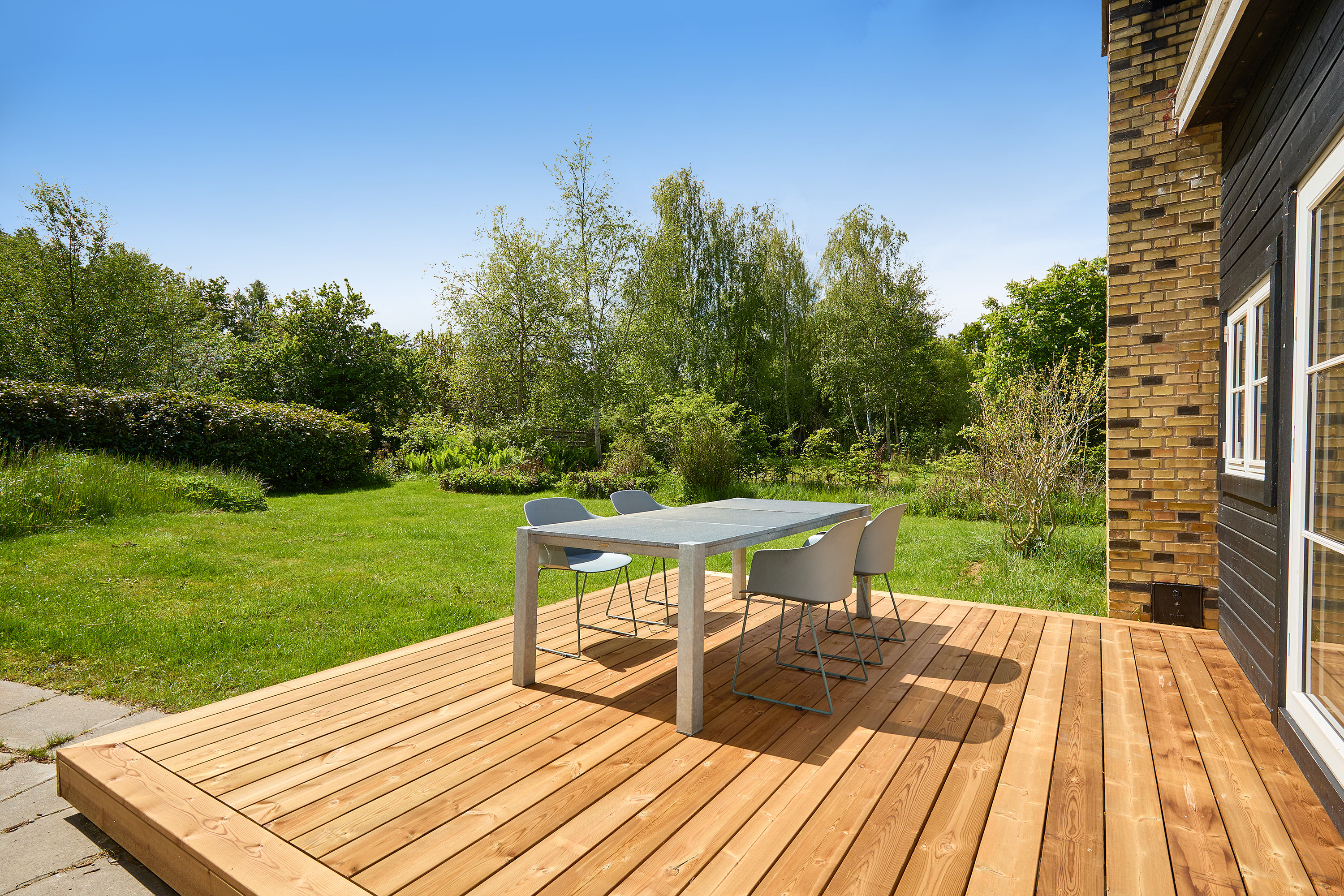 Fremhævet terrasse billede i fuldskærmstilstand. Billede af Baune-Åsen 5B, Rågeleje, 3210 Vejby