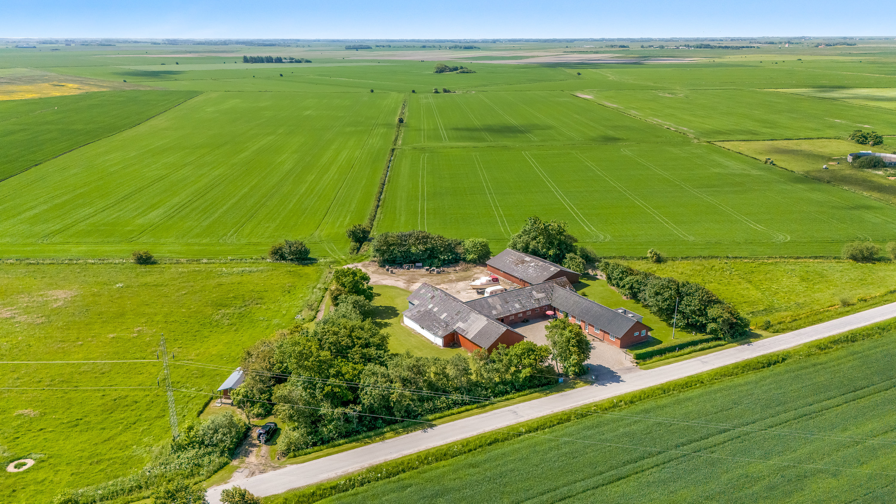 Fremhævet luftfoto billede i fuldskærmstilstand. Billede af Kannikhusvej 2, Bønderby, 6270 Tønder
