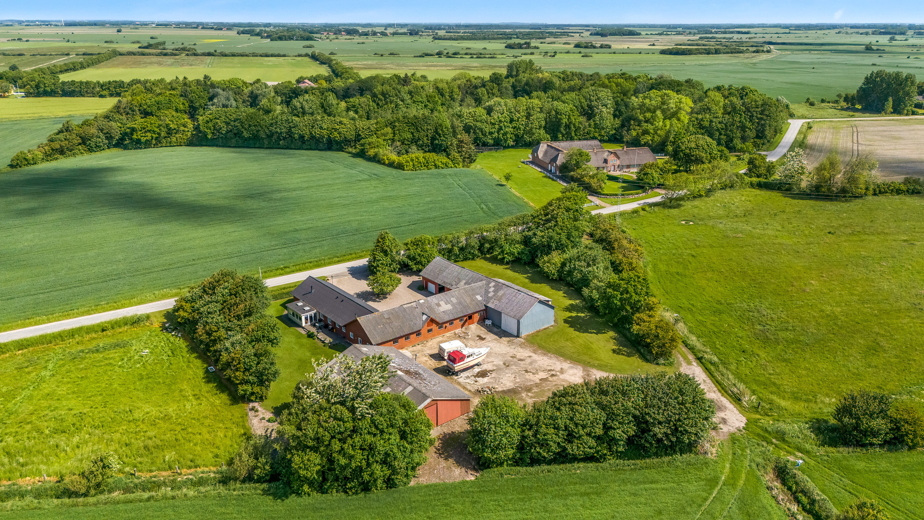 Fremhævet luftfoto billede i fuldskærmstilstand. Billede af Kannikhusvej 2, Bønderby, 6270 Tønder