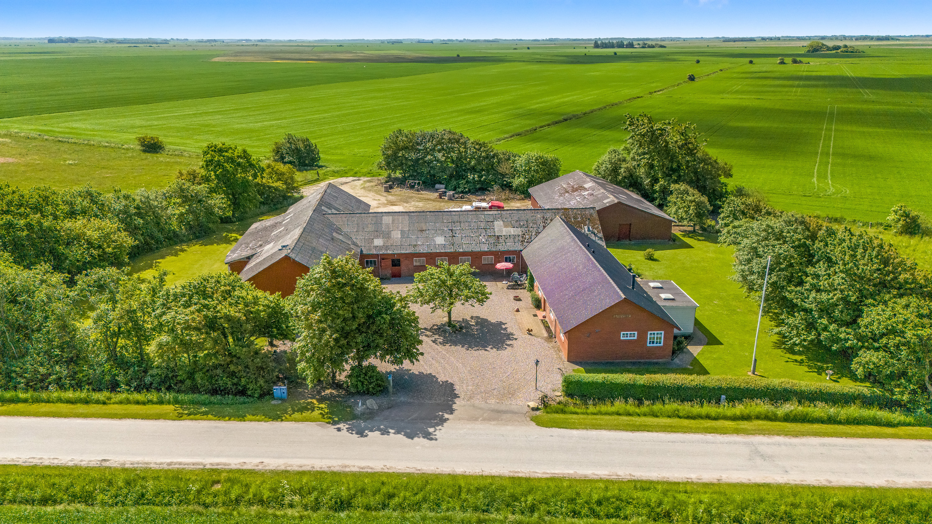 Fremhævet luftfoto billede i fuldskærmstilstand. Billede af Kannikhusvej 2, Bønderby, 6270 Tønder