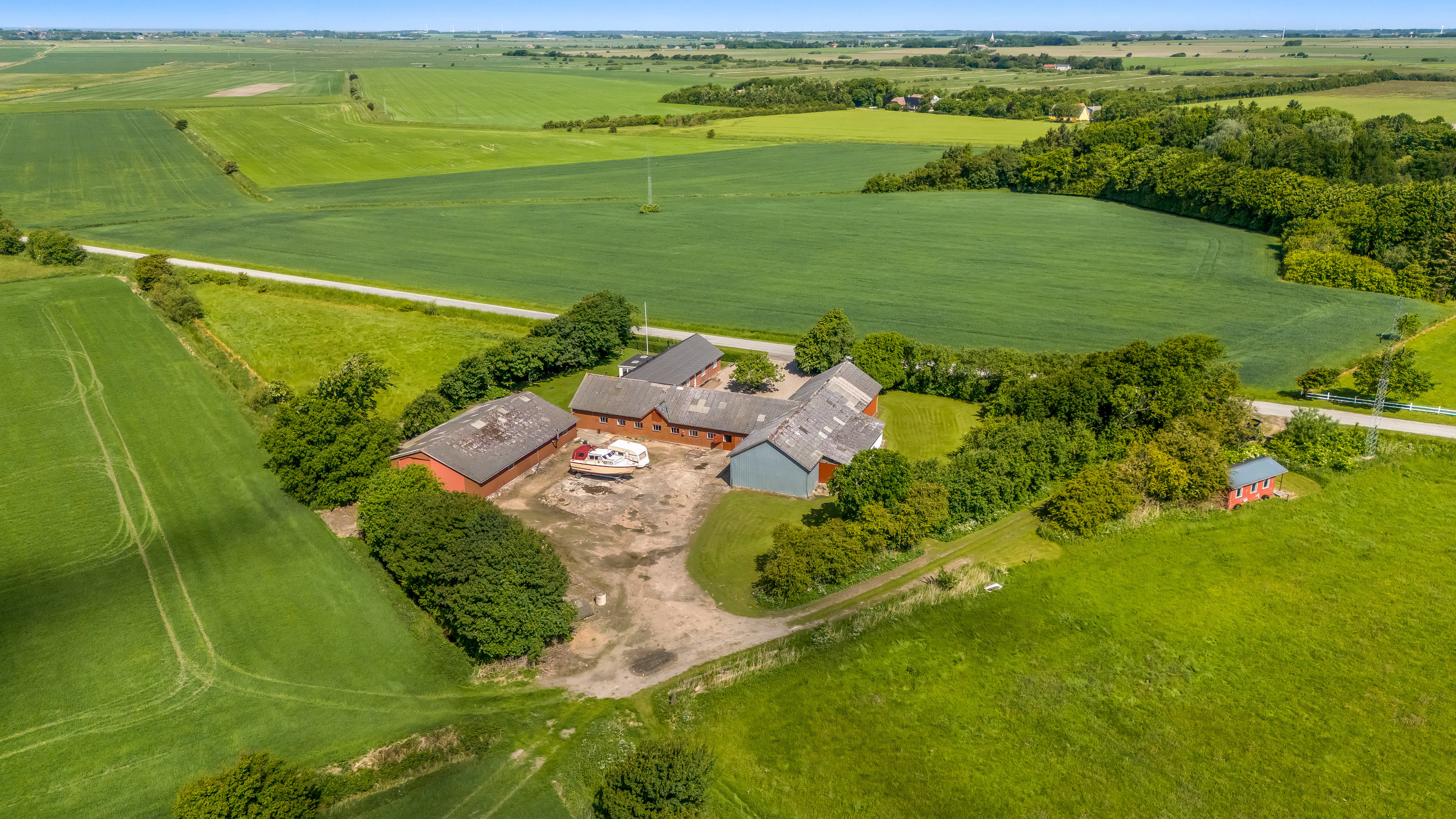 Fremhævet luftfoto billede i fuldskærmstilstand. Billede af Kannikhusvej 2, Bønderby, 6270 Tønder