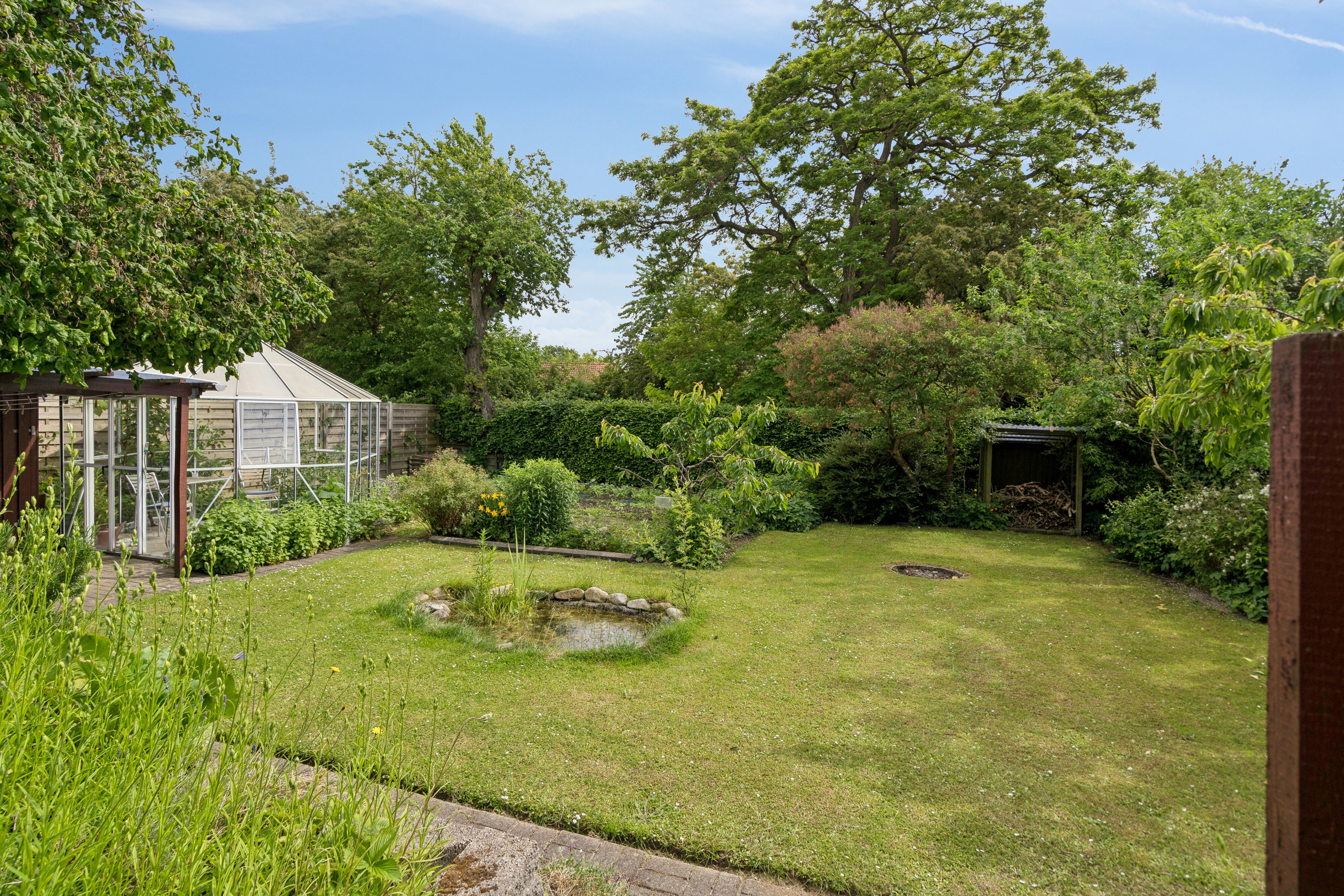 Fremhævet set fra haven billede i fuldskærmstilstand. Billede af Gyldenstenvej 33, 5230 Odense M