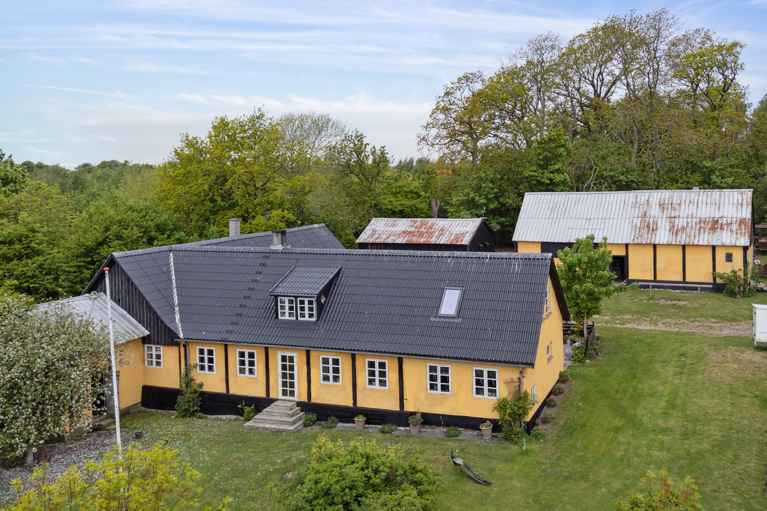 Fremhævet set fra haven billede i fuldskærmstilstand. Billede af Krækketsvej 3, Østerlars, 3760 Gudhjem