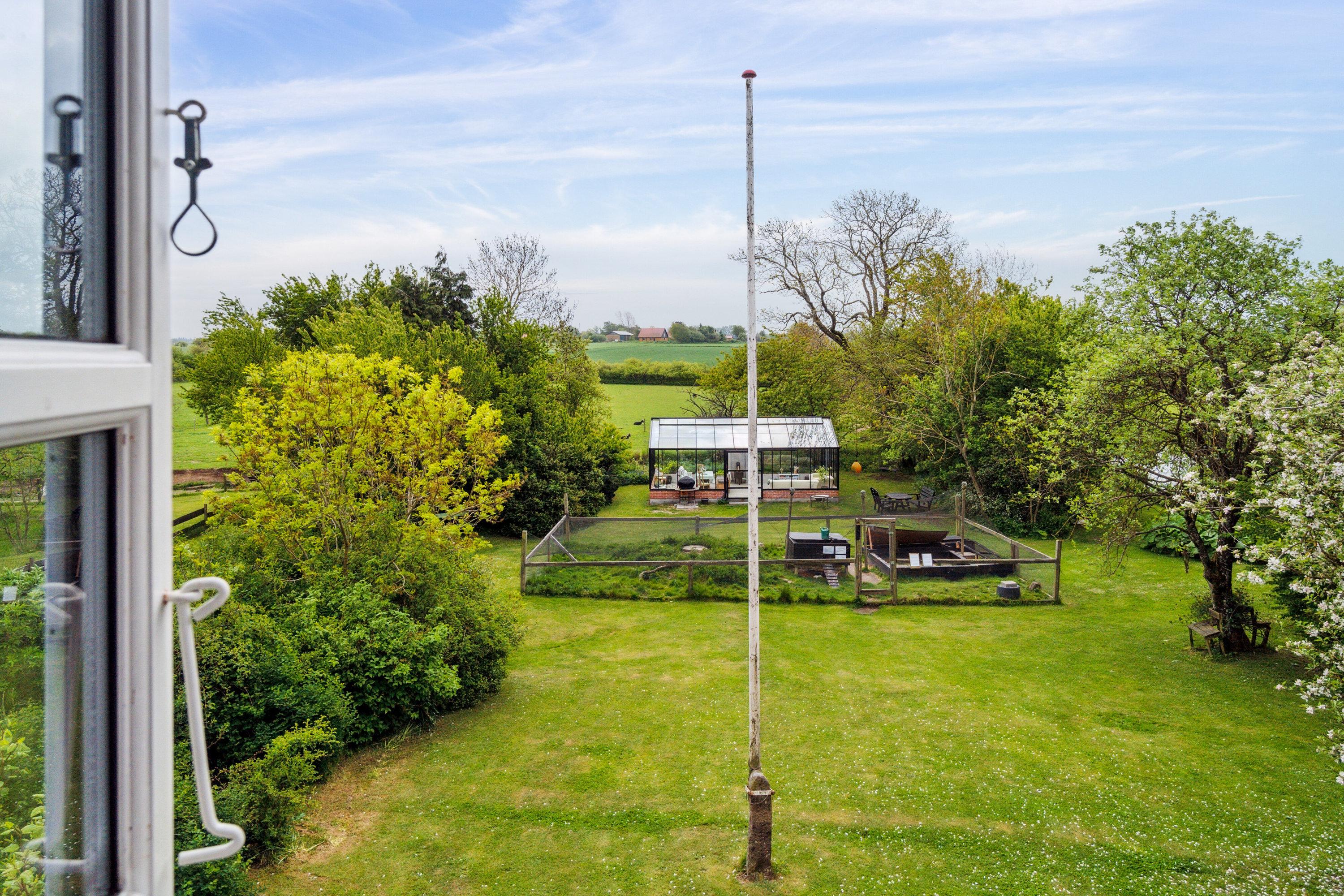 Fremhævet udsigt billede i fuldskærmstilstand. Billede af Krækketsvej 3, Østerlars, 3760 Gudhjem