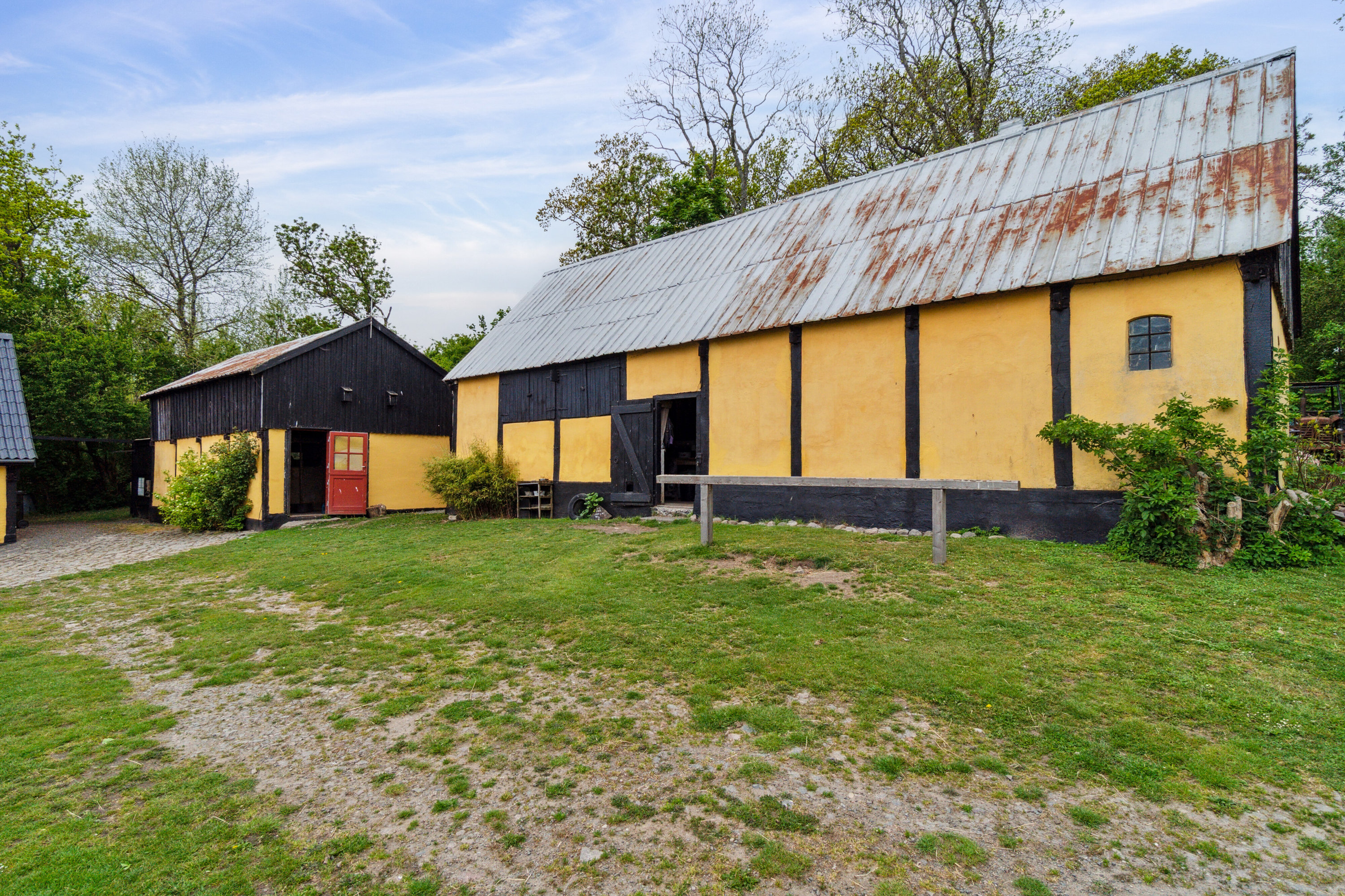 Fremhævet set fra haven billede i fuldskærmstilstand. Billede af Krækketsvej 3, Østerlars, 3760 Gudhjem