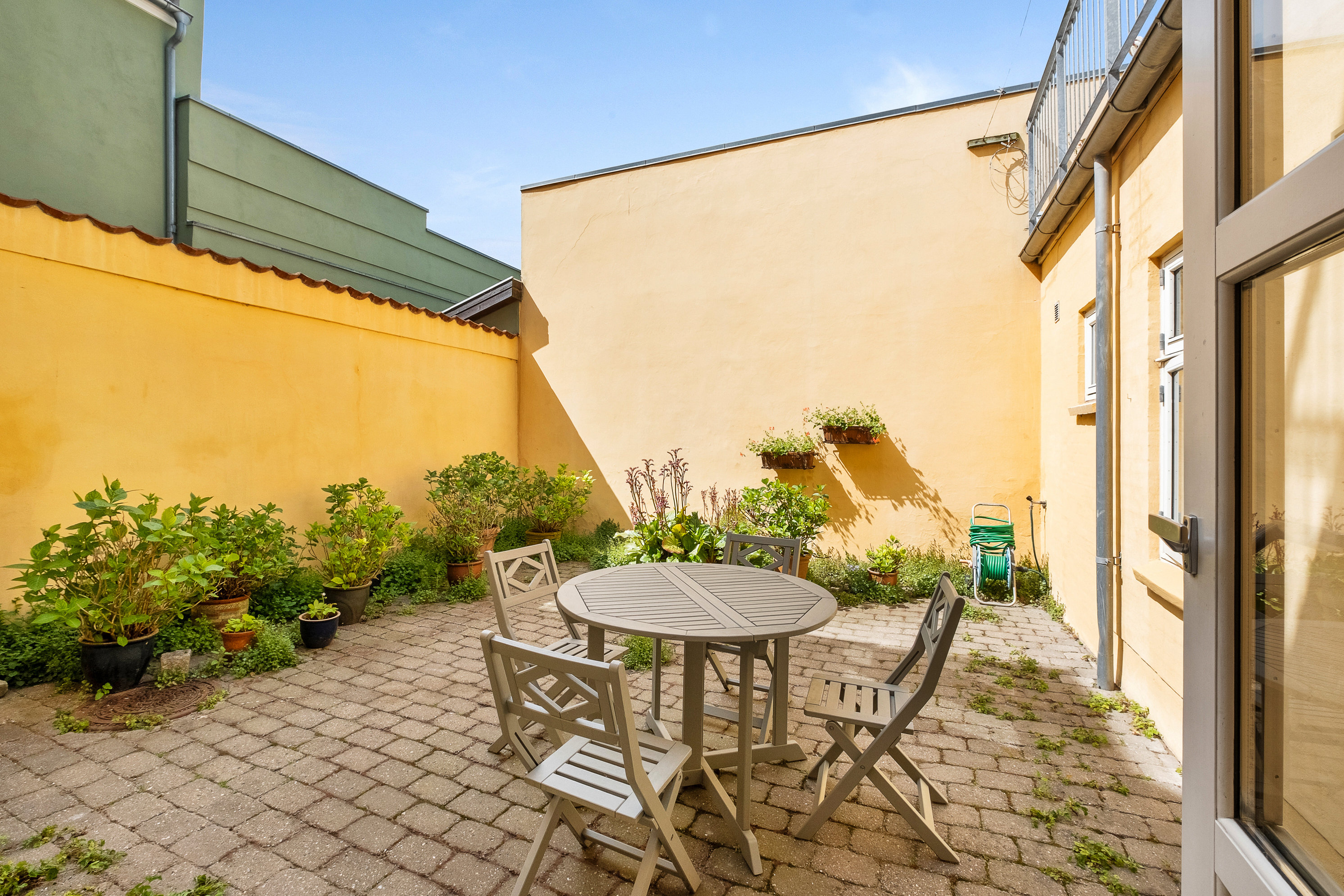 Fremhævet gårdmiljø billede i fuldskærmstilstand. Billede af Bülowsgade 8, 8000 Aarhus C