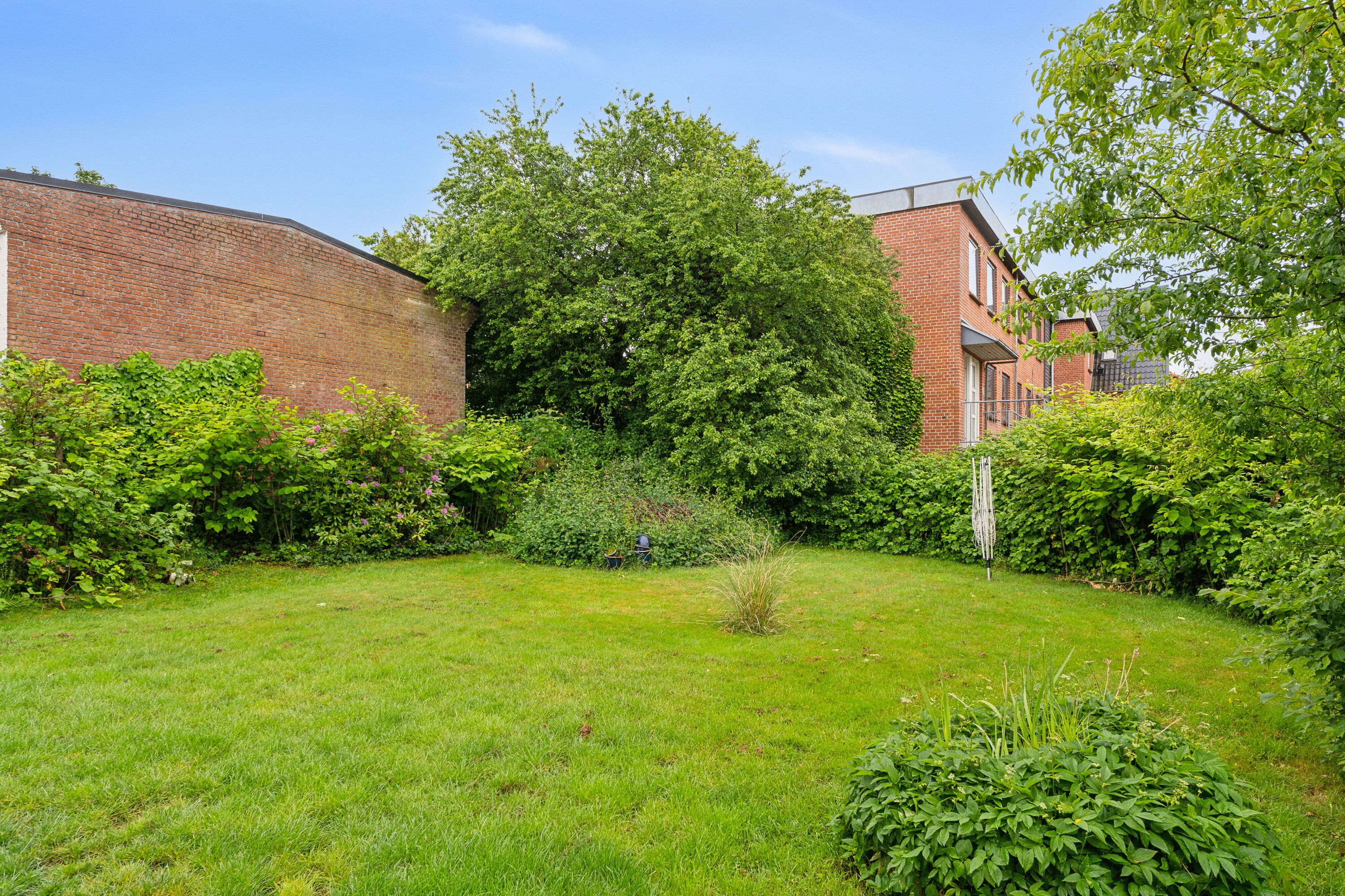 Fremhævet set fra haven billede i fuldskærmstilstand. Billede af Kristiansgade 33, 1., 7430 Ikast