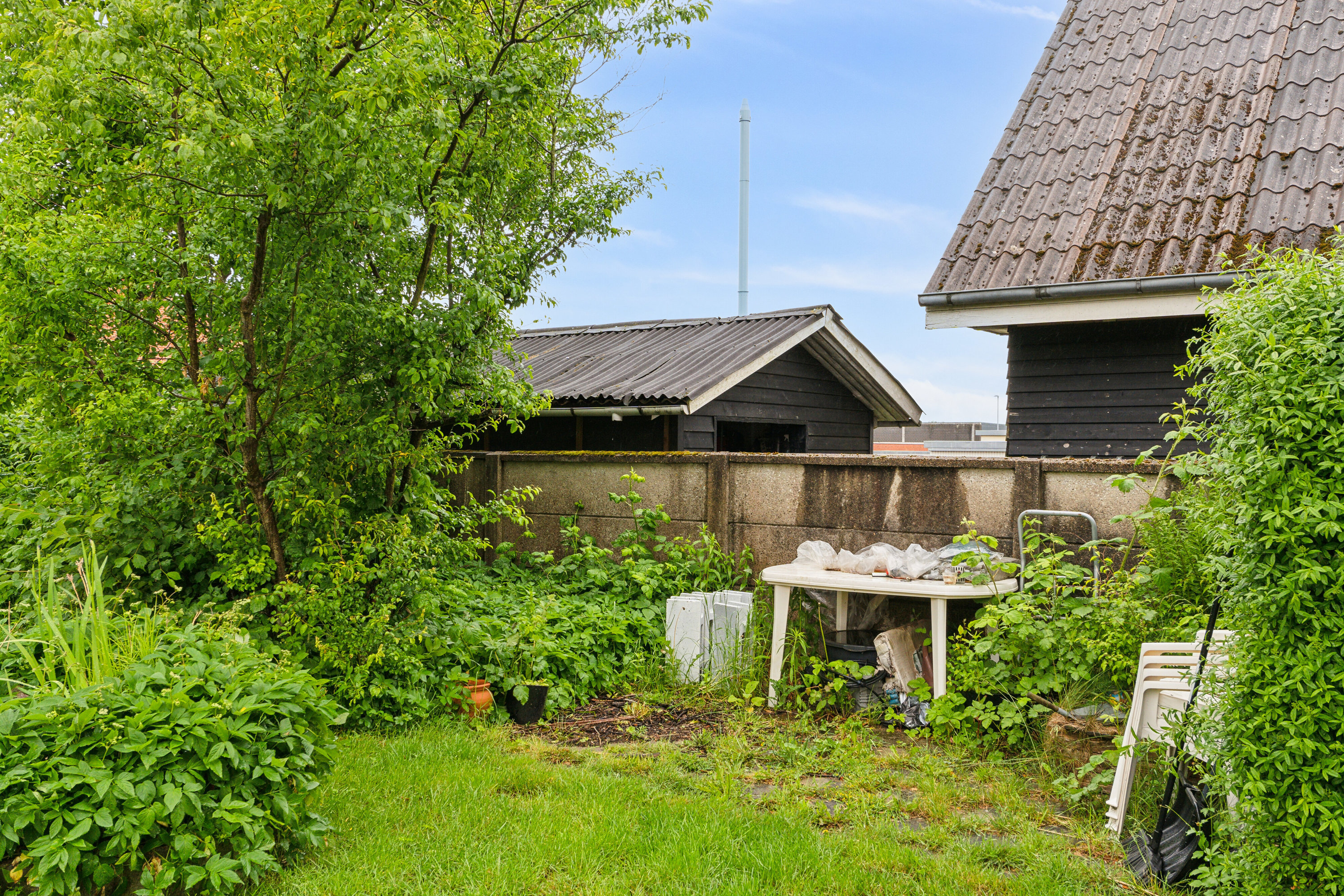 Fremhævet set fra haven billede i fuldskærmstilstand. Billede af Kristiansgade 33, 1., 7430 Ikast