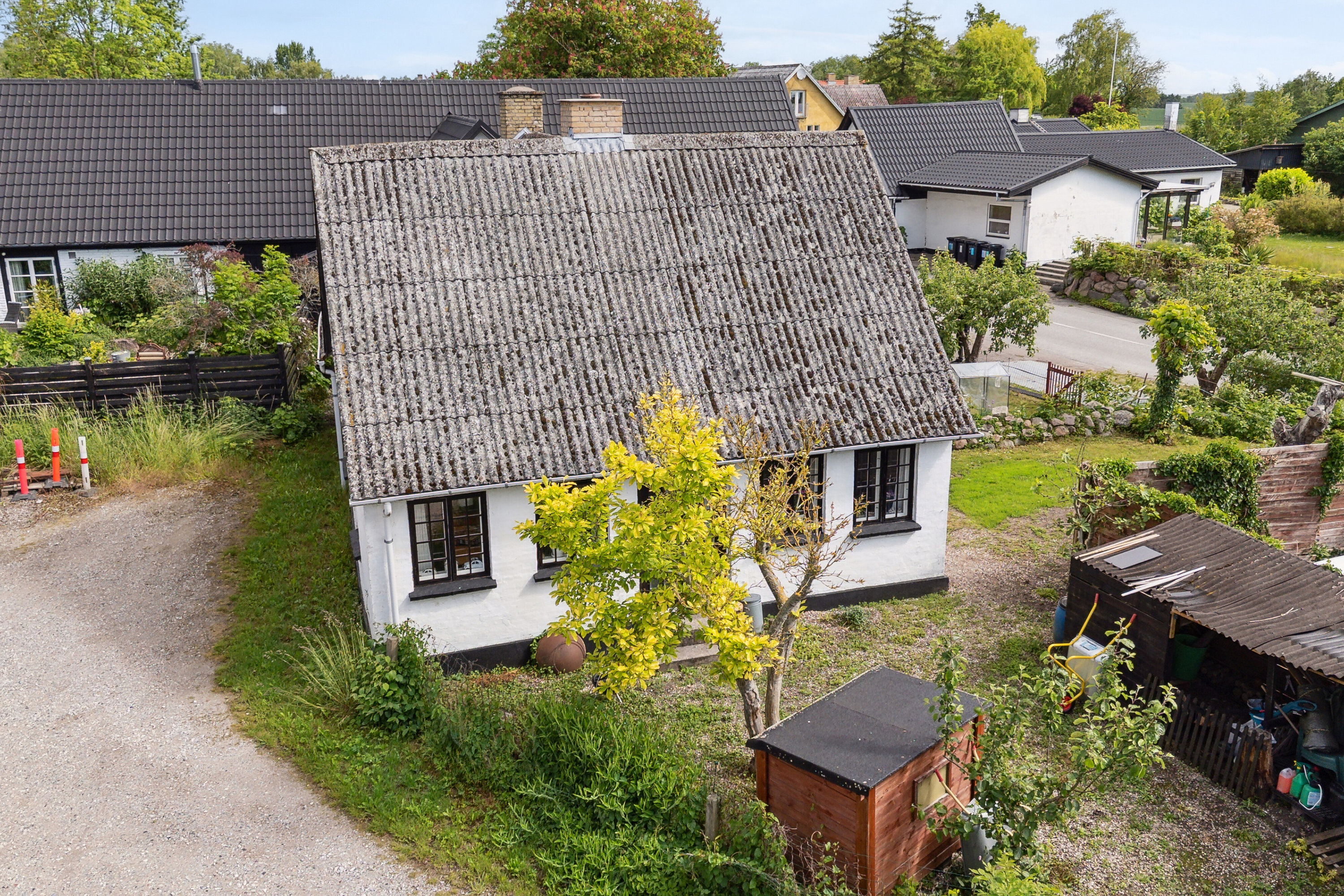 Fremhævet set fra haven billede i fuldskærmstilstand. Billede af Sønderbyvej 1, Sønderby, 4050 Skibby