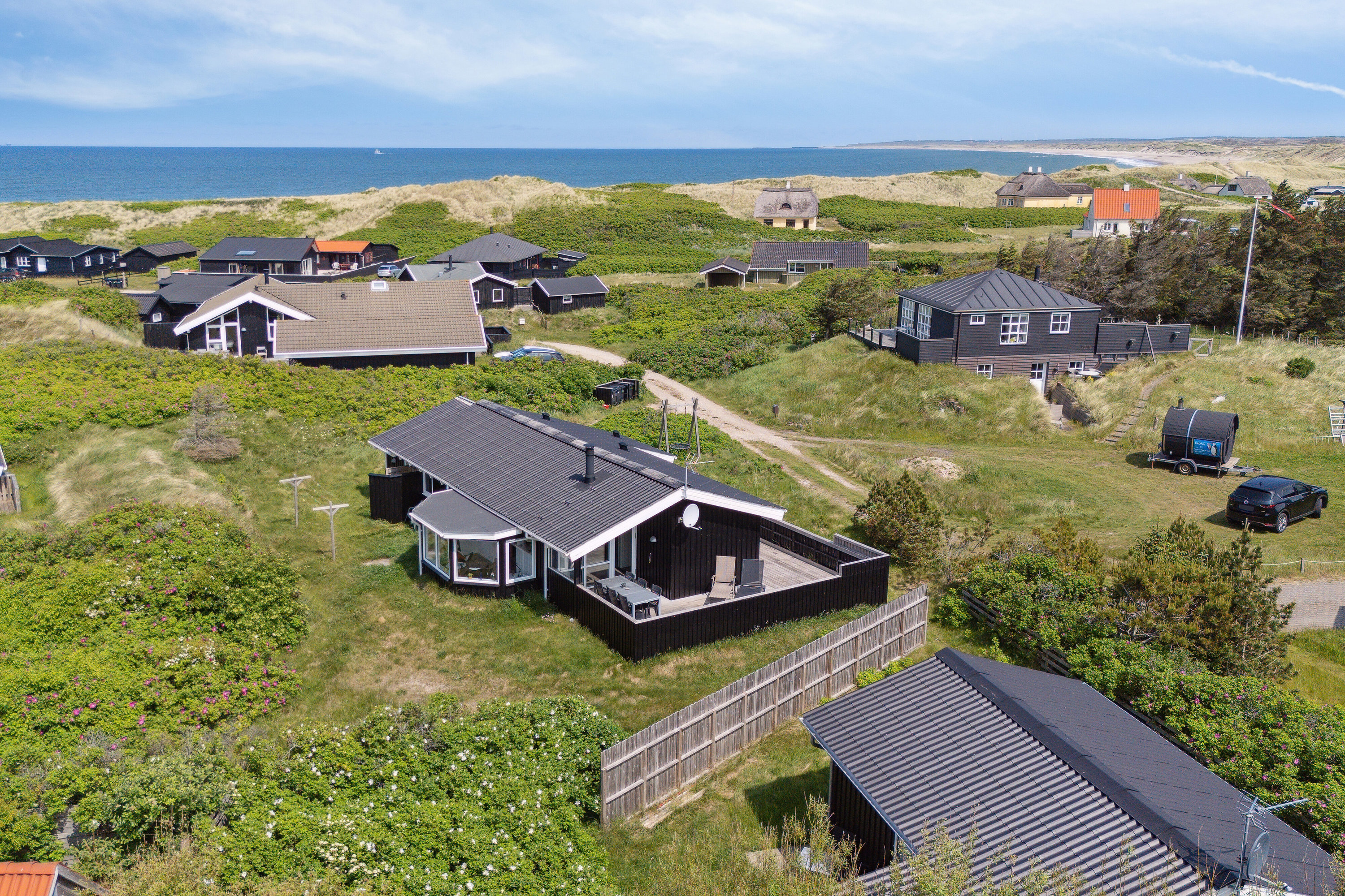 Fremhævet set fra haven billede i fuldskærmstilstand. Billede af Tuerbak 26, Klitmøller, 7700 Thisted