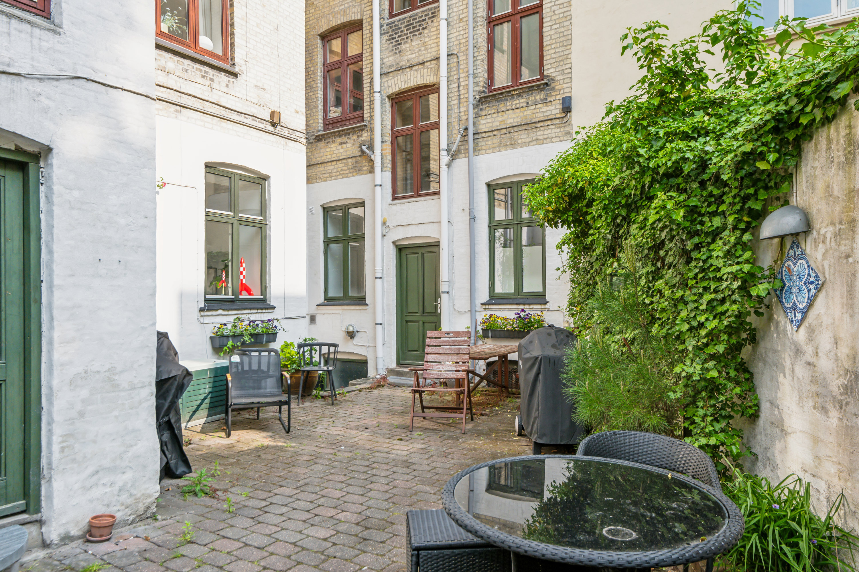 Fremhævet gårdmiljø billede i fuldskærmstilstand. Billede af Løkkegade 15, 2. tv., 9000 Aalborg