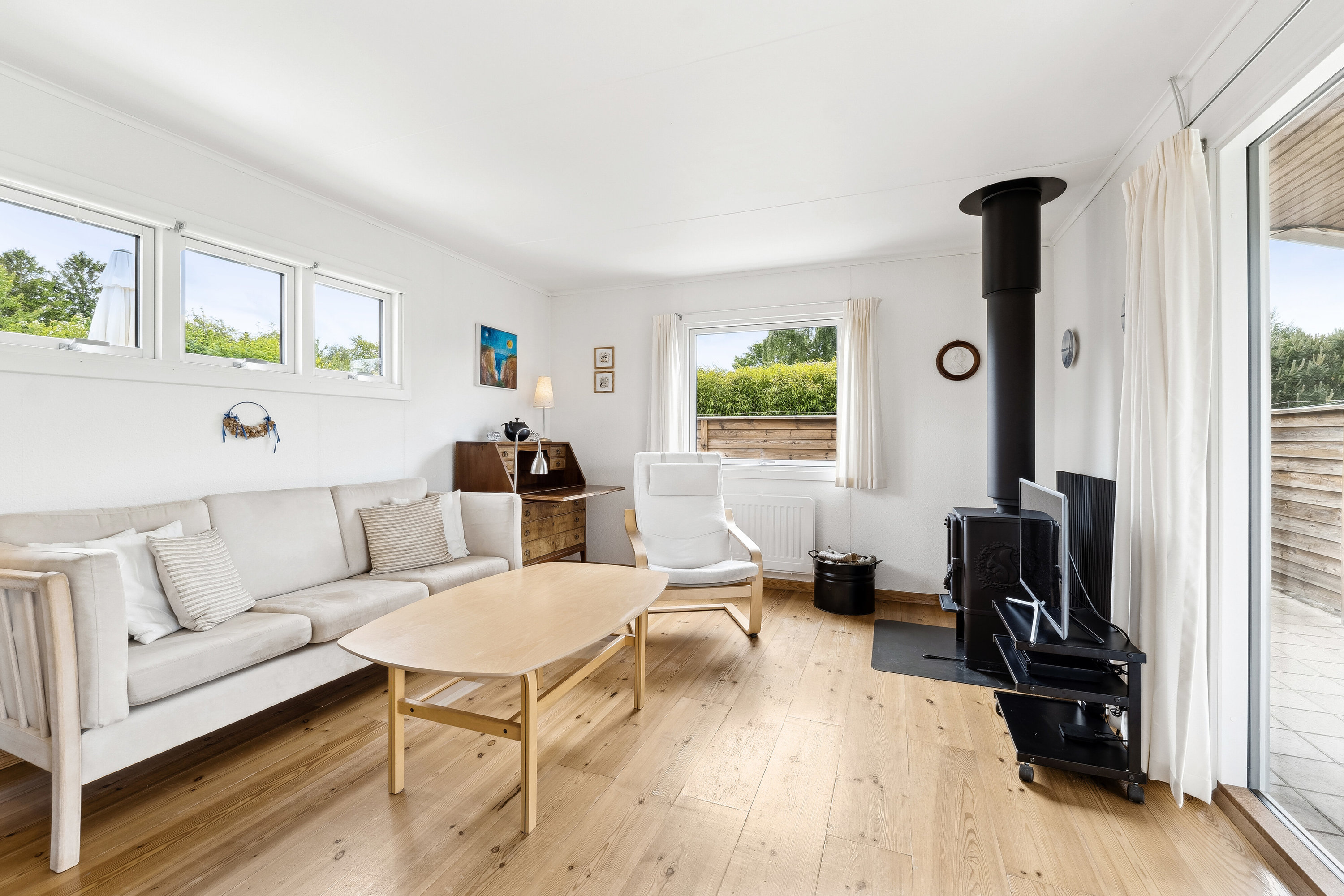 Fremhævet stue billede i fuldskærmstilstand. Billede af Strandparken 7, Bøsserup, 4500 Nykøbing Sj