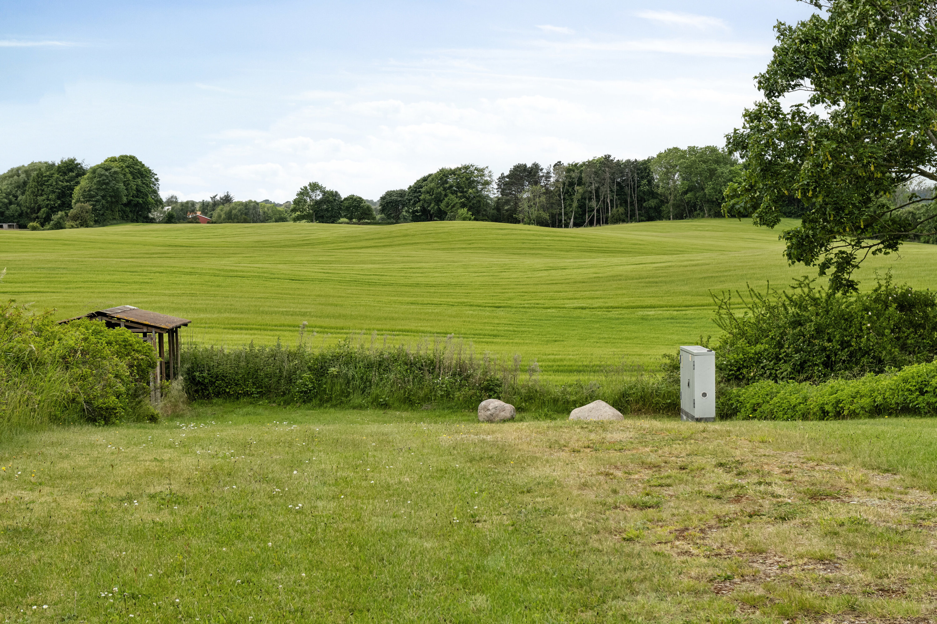 Fremhævet set fra haven billede i fuldskærmstilstand. Billede af Strandparken 7, Bøsserup, 4500 Nykøbing Sj