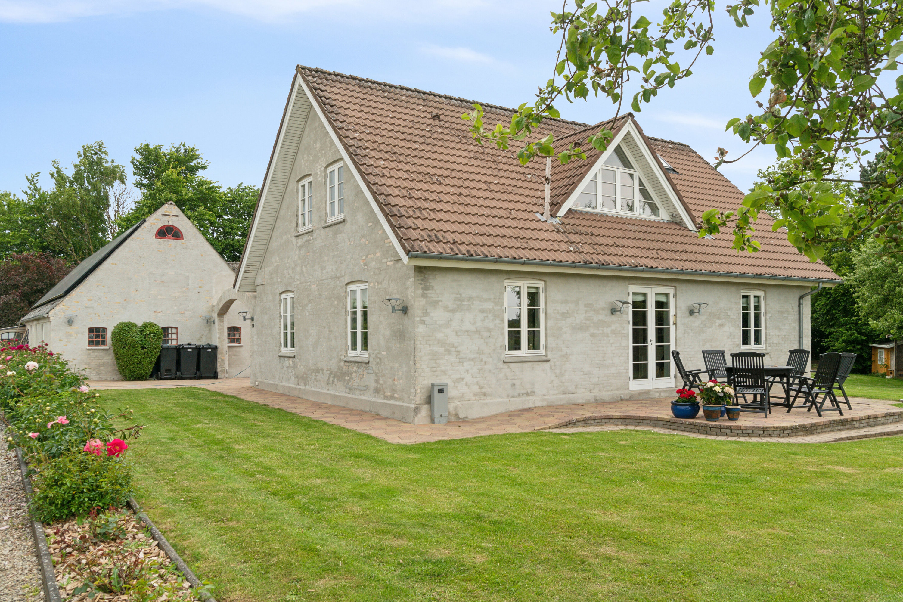 Fremhævet set fra haven billede i fuldskærmstilstand. Billede af Vollerupvej 14, Vollerup, 4200 Slagelse