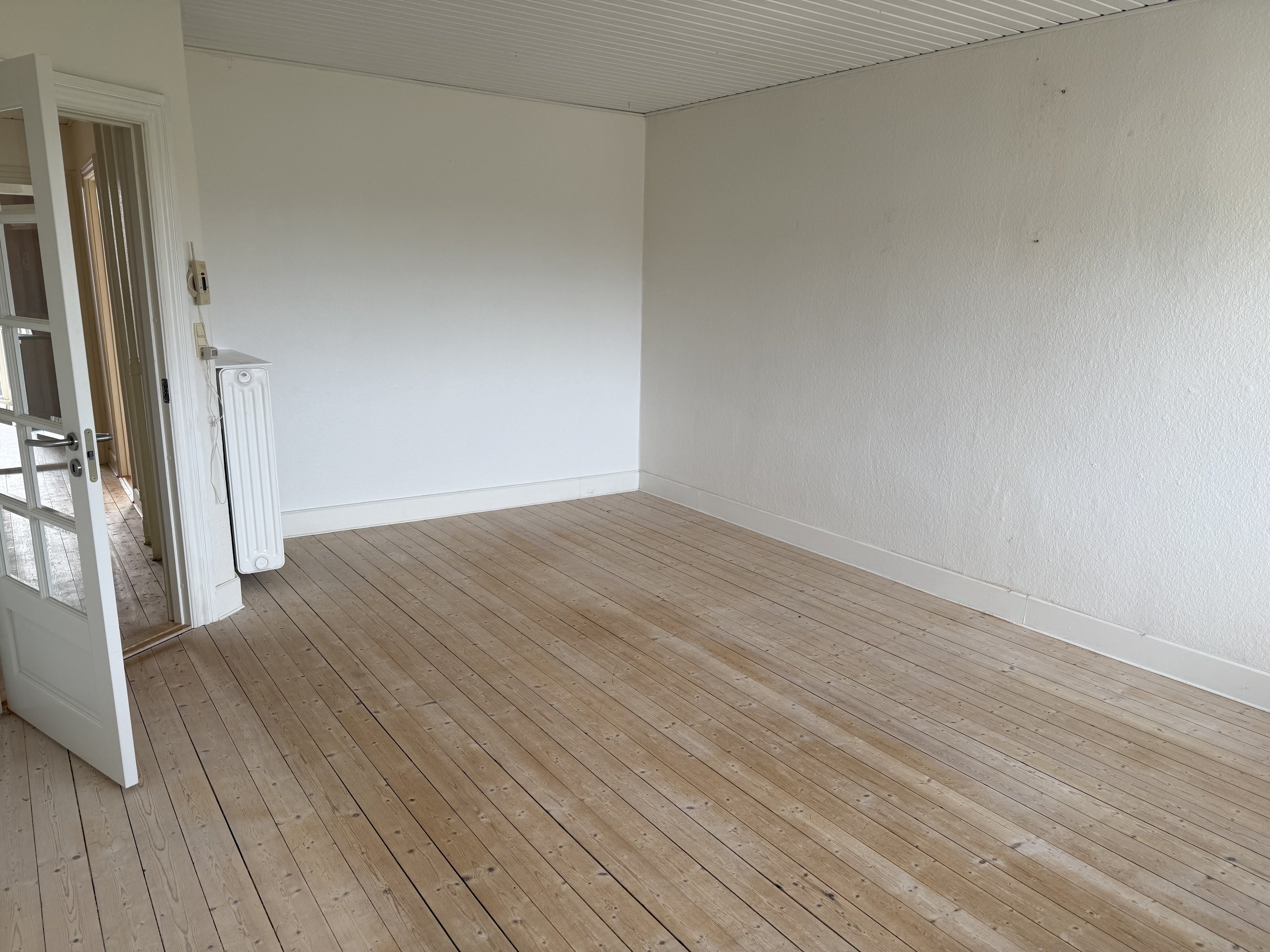 Fremhævet stue billede i fuldskærmstilstand. Billede af Rolighedsvej 7A, 1. th., 9400 Nørresundby