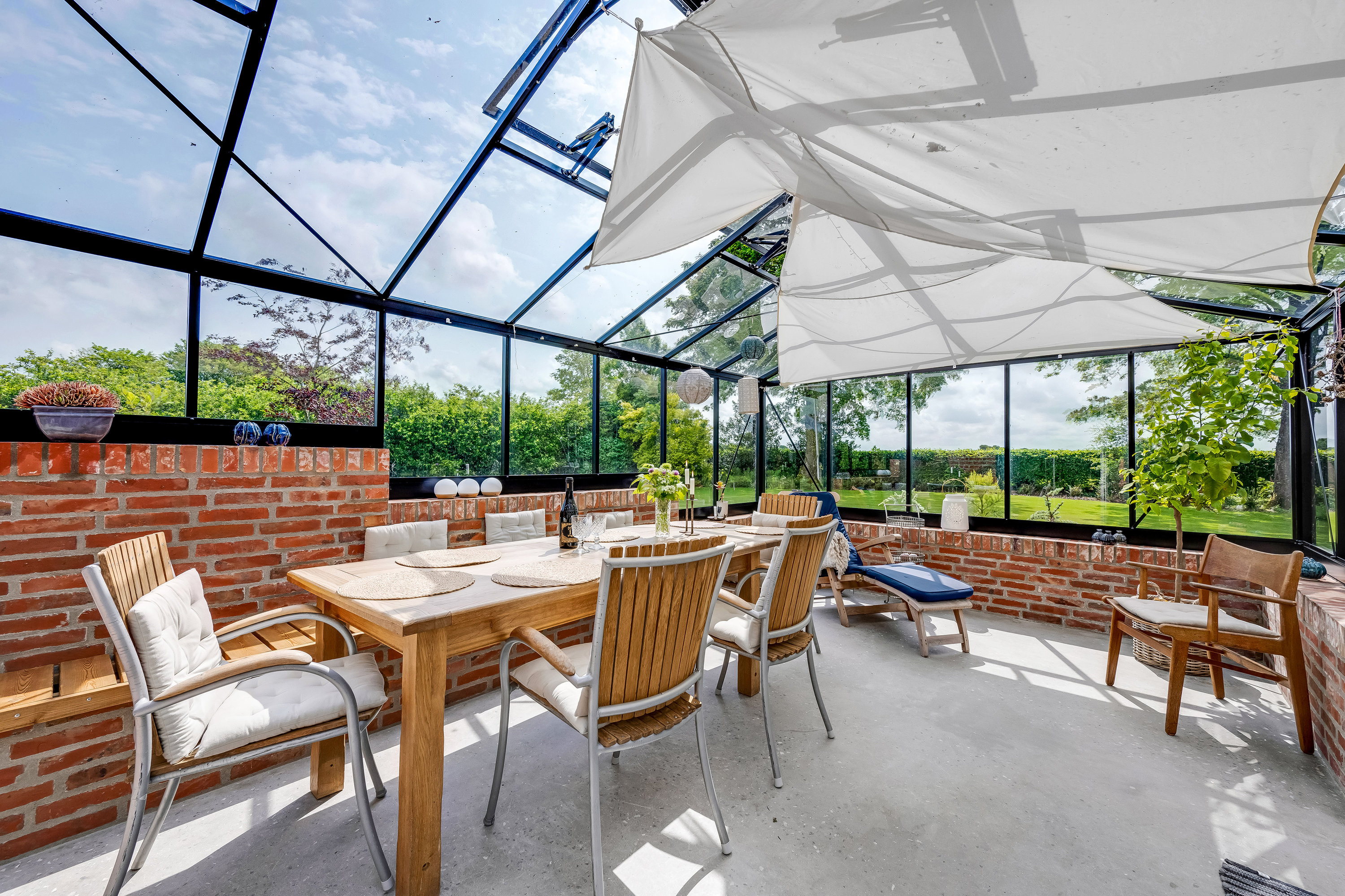 Fremhævet udestue  billede i fuldskærmstilstand. Billede af Øster Vejrupvej 7, Lyne, 6880 Tarm