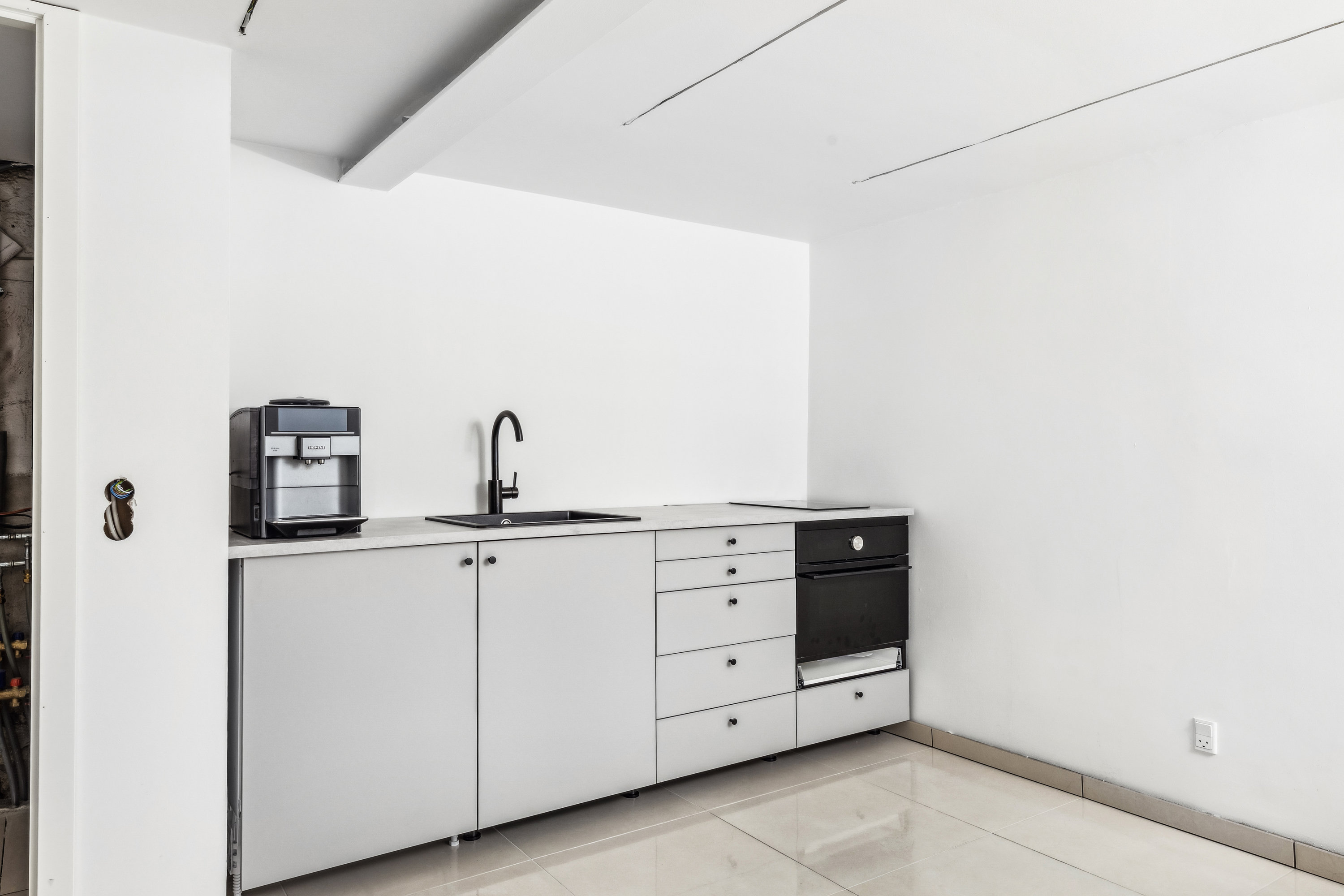 Fremhævet køkken billede i fuldskærmstilstand. Billede af Taastrup Hovedgade 47, 2630 Taastrup