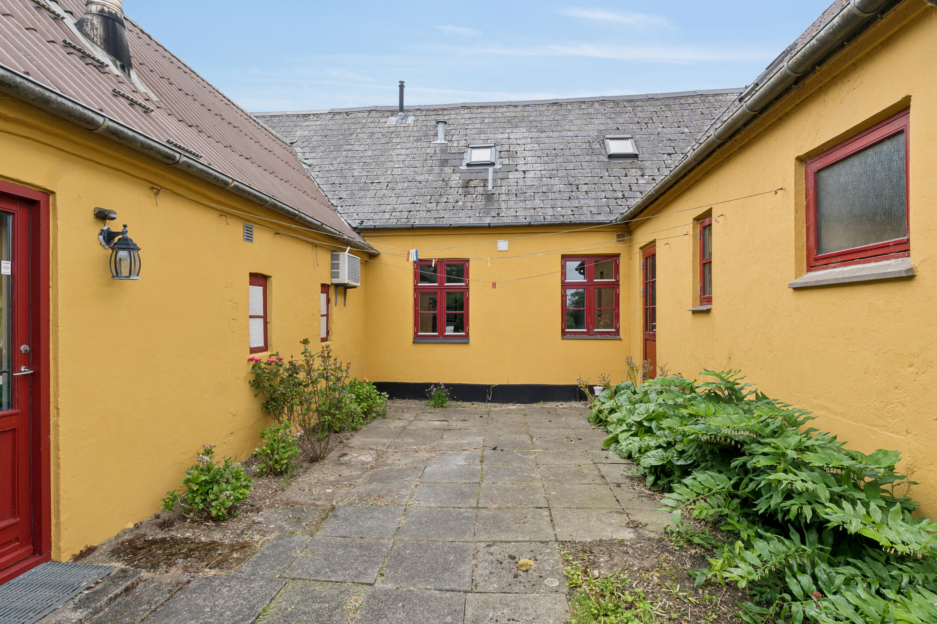 Fremhævet udendørs billede i fuldskærmstilstand. Billede af Kildebakken 29, Everdrup, 4733 Tappernøje