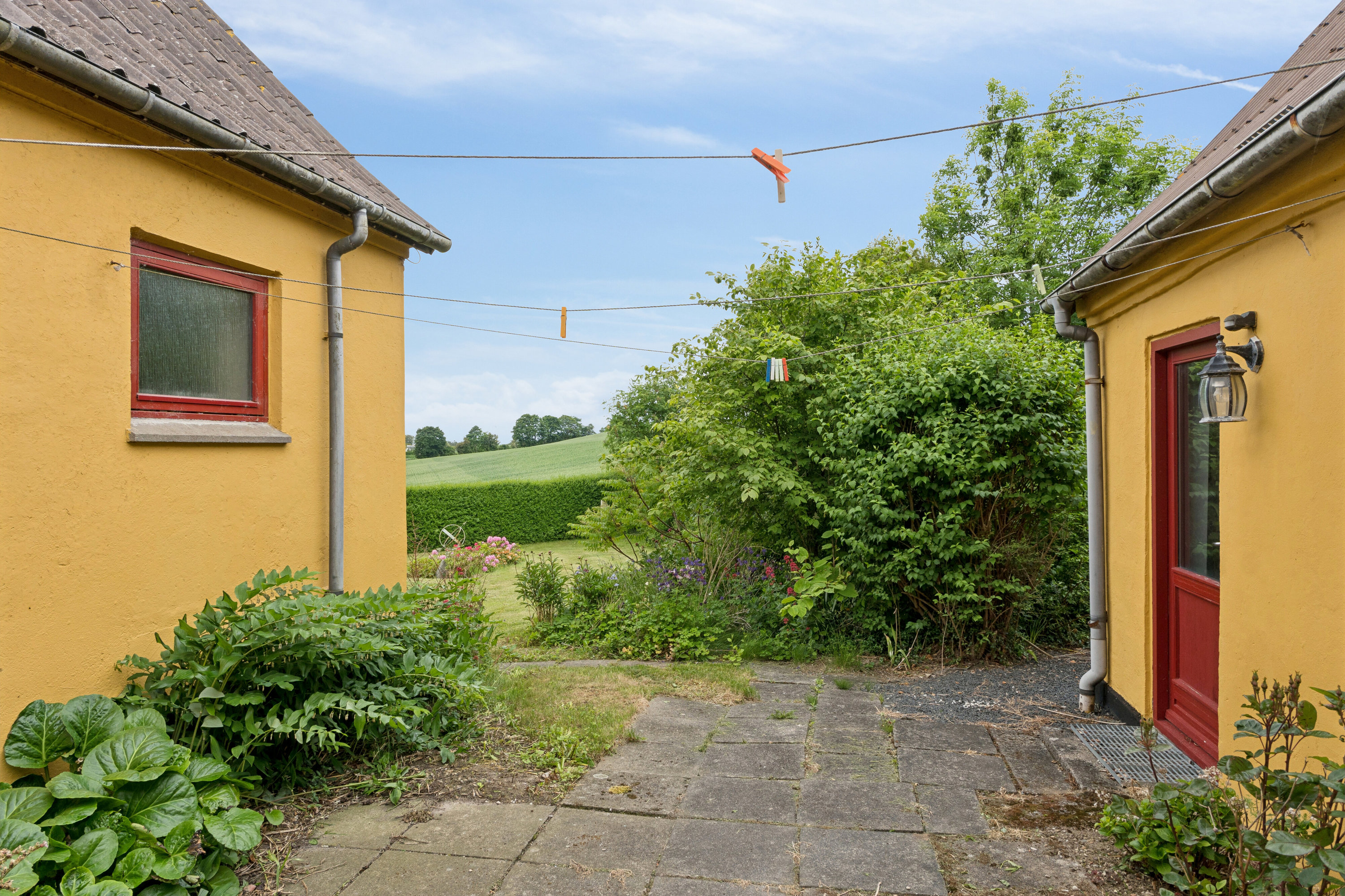 Fremhævet udendørs billede i fuldskærmstilstand. Billede af Kildebakken 29, Everdrup, 4733 Tappernøje