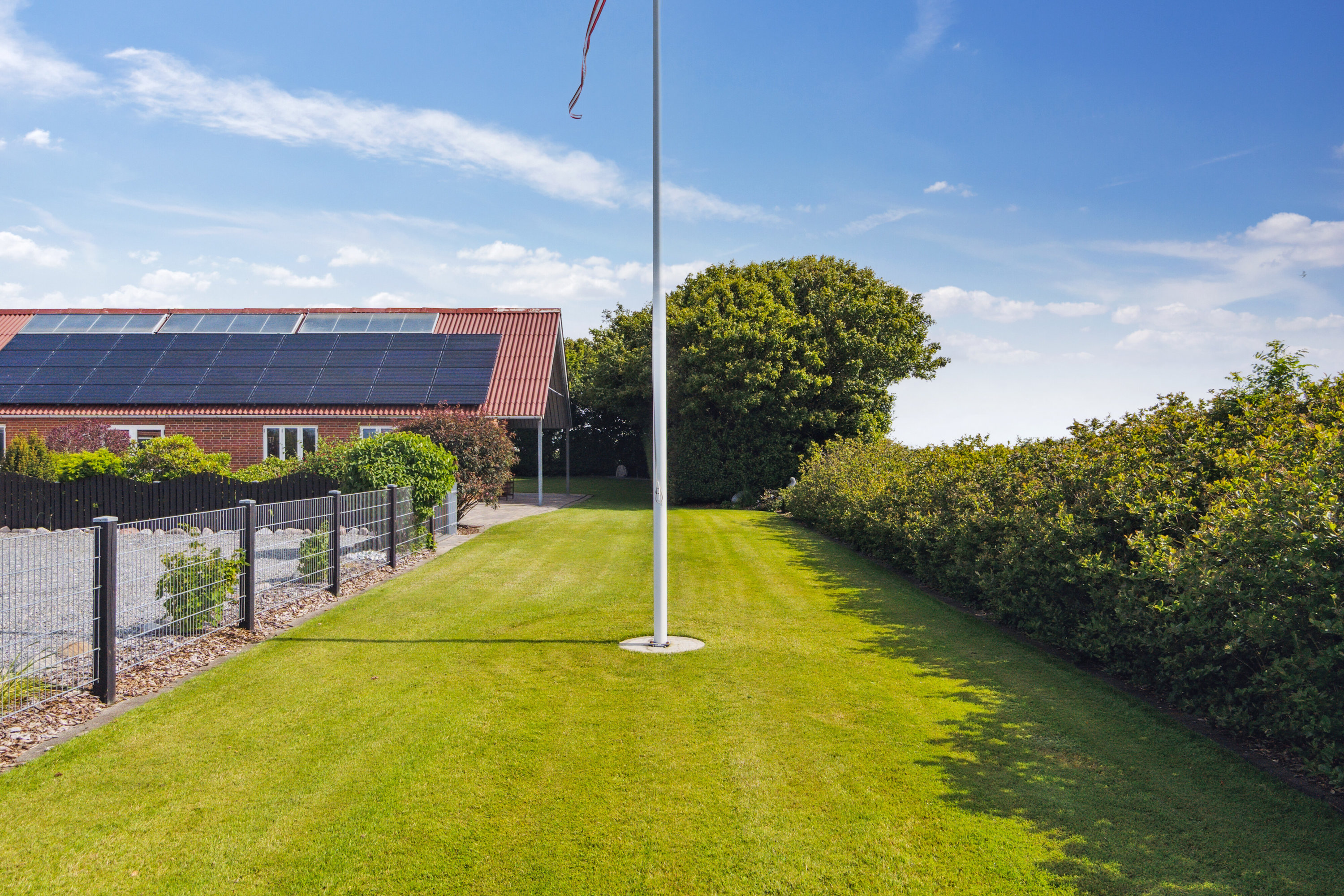 Fremhævet set fra haven billede i fuldskærmstilstand. Billede af Kystvejen 81, 7755 Bedsted Thy