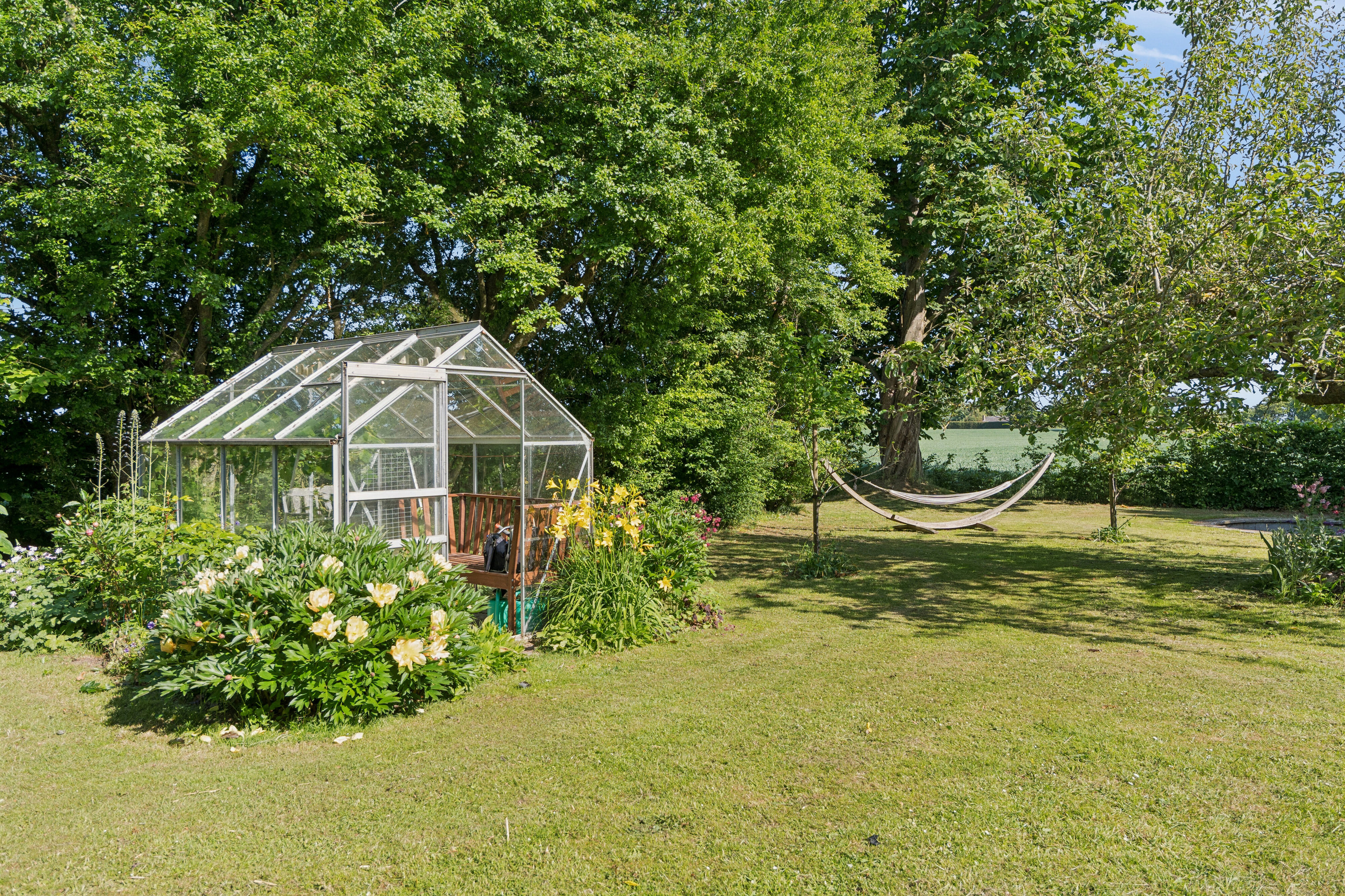 Fremhævet set fra haven billede i fuldskærmstilstand. Billede af Jullerupvej 52, Jullerup, 5471 Søndersø