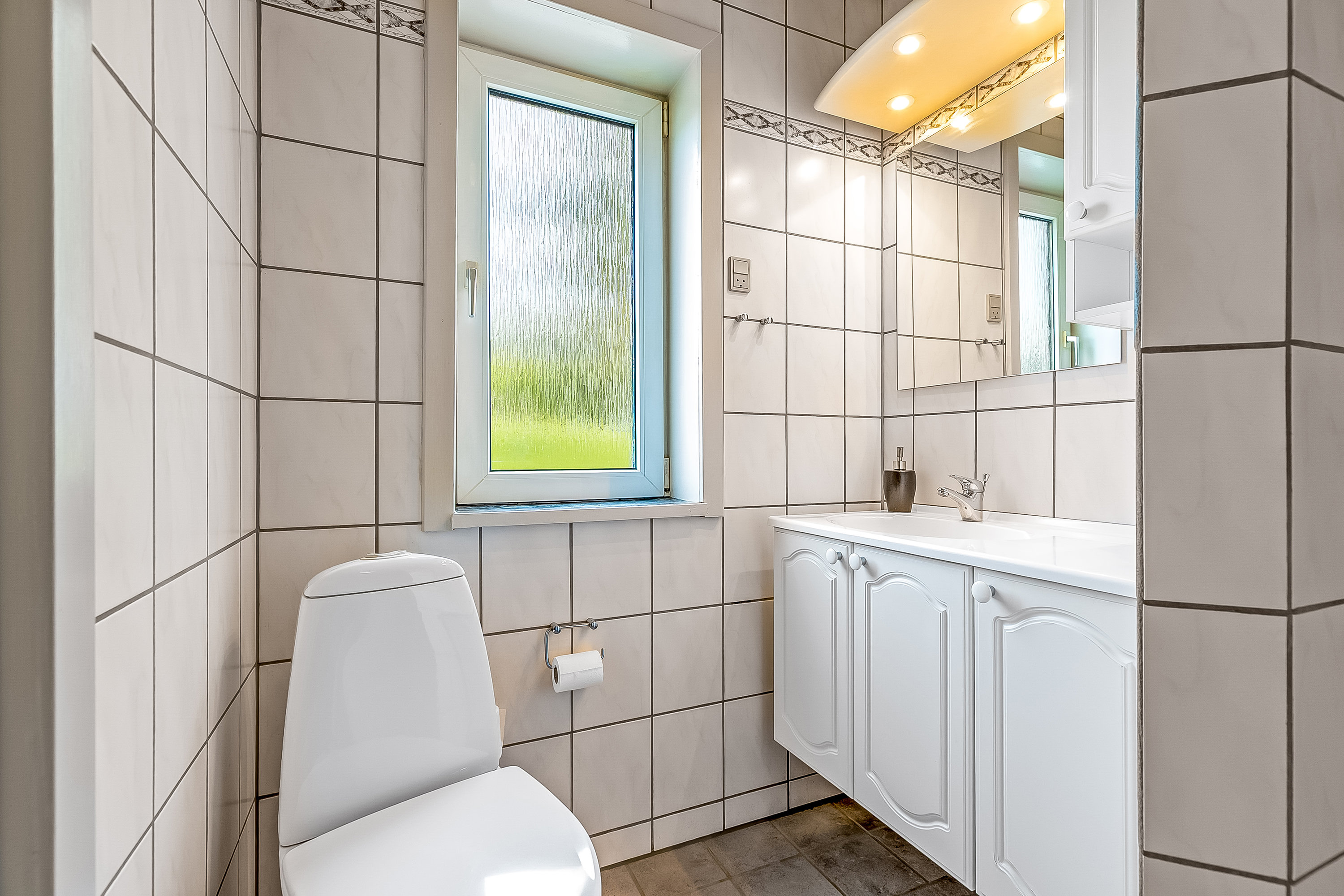 Fremhævet badeværelse billede i fuldskærmstilstand. Billede af Stenderupvej 36, Agtrup, 6091 Bjert