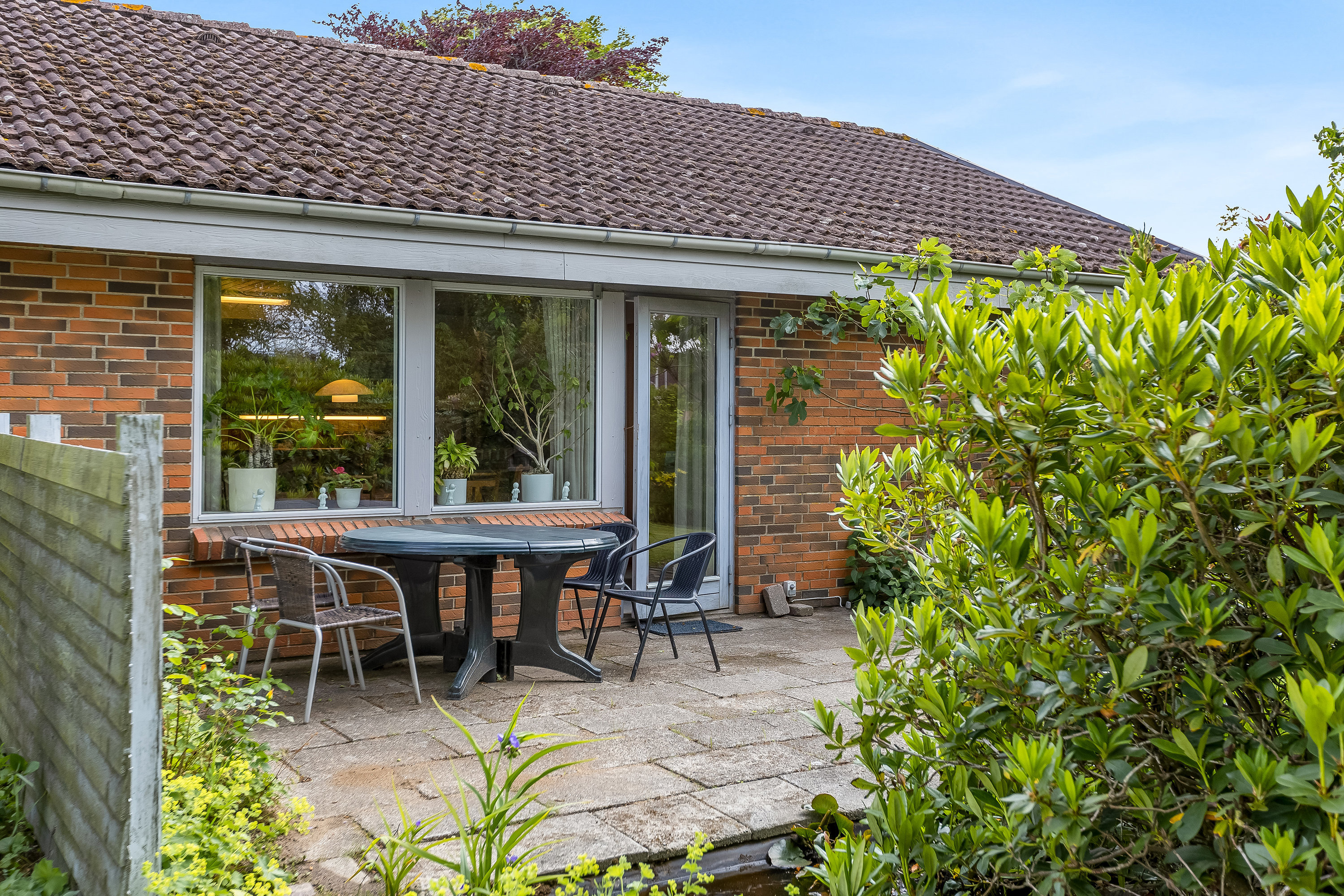 Fremhævet terrasse billede i fuldskærmstilstand. Billede af Midsommervej 103, 6261 Bredebro