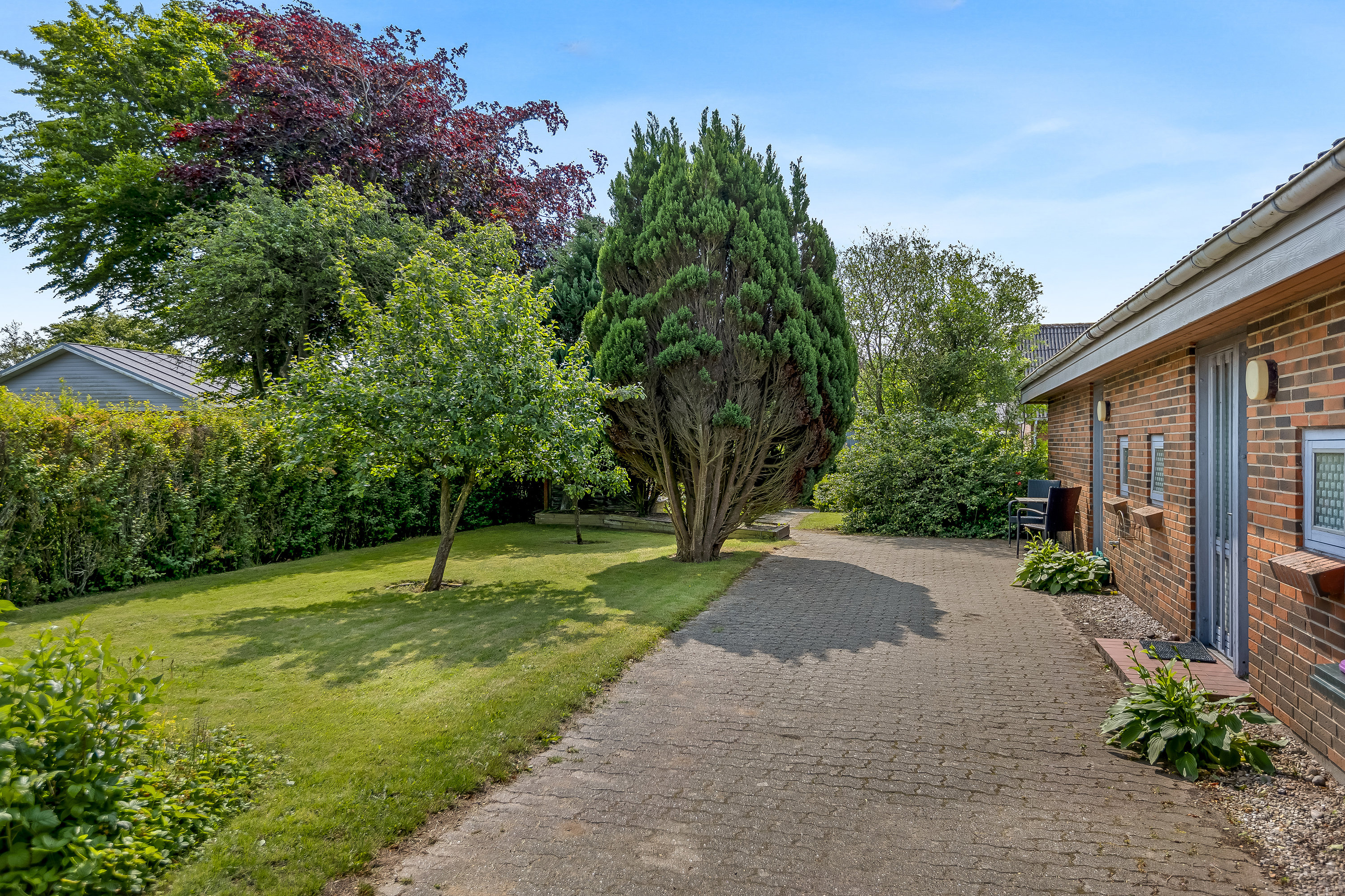 Fremhævet facade billede i fuldskærmstilstand. Billede af Midsommervej 103, 6261 Bredebro