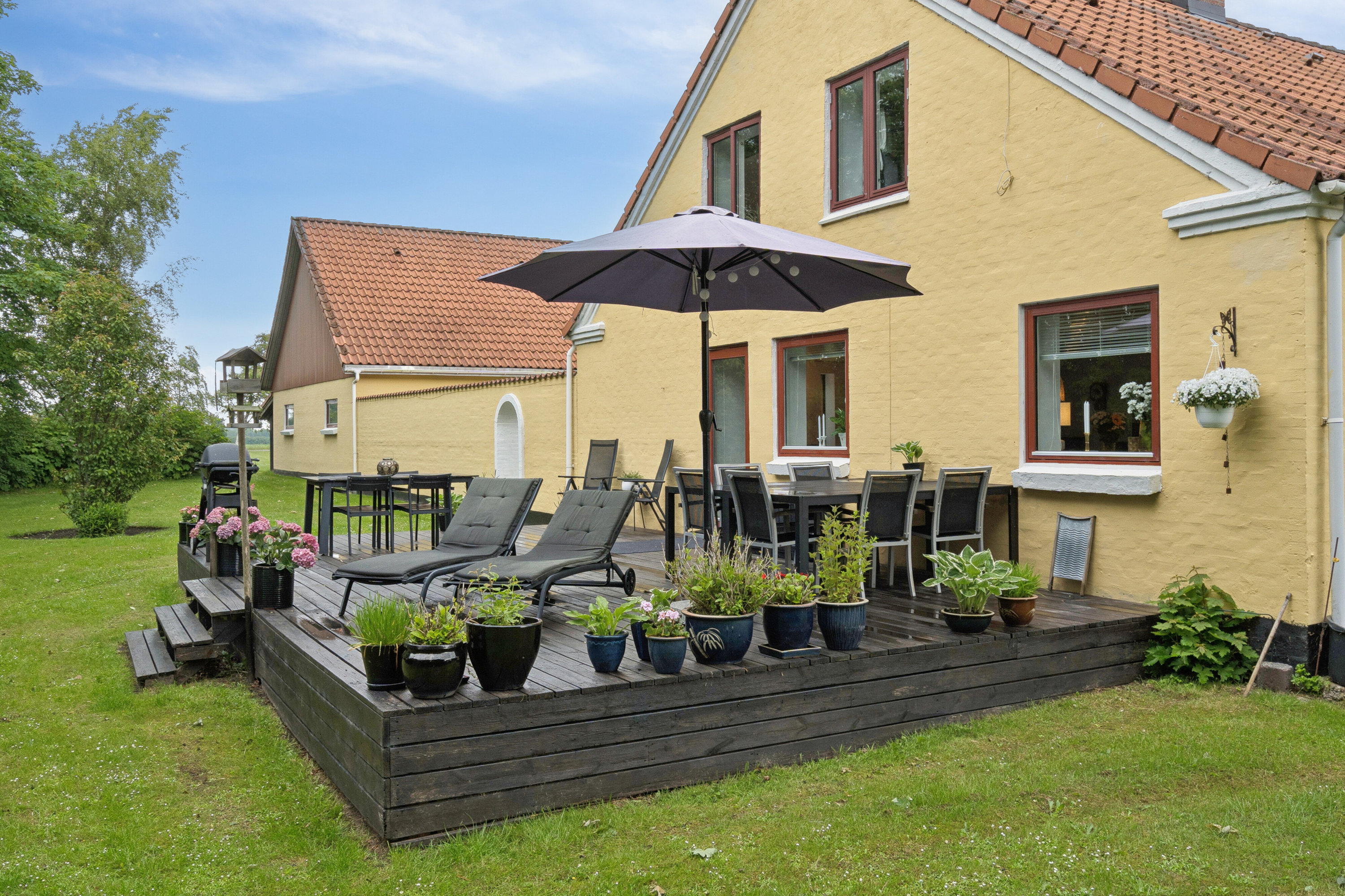 Villa: Set fra haven på Pletvej 135, Mosbjerg, 9870 Sindal