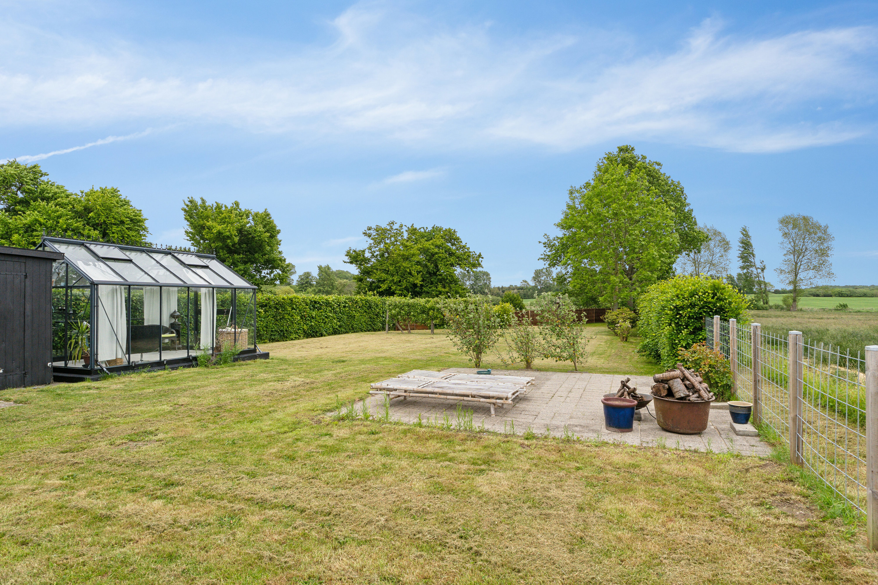 Fremhævet set fra haven billede i fuldskærmstilstand. Billede af Højensvej 140, Egense, 5700 Svendborg