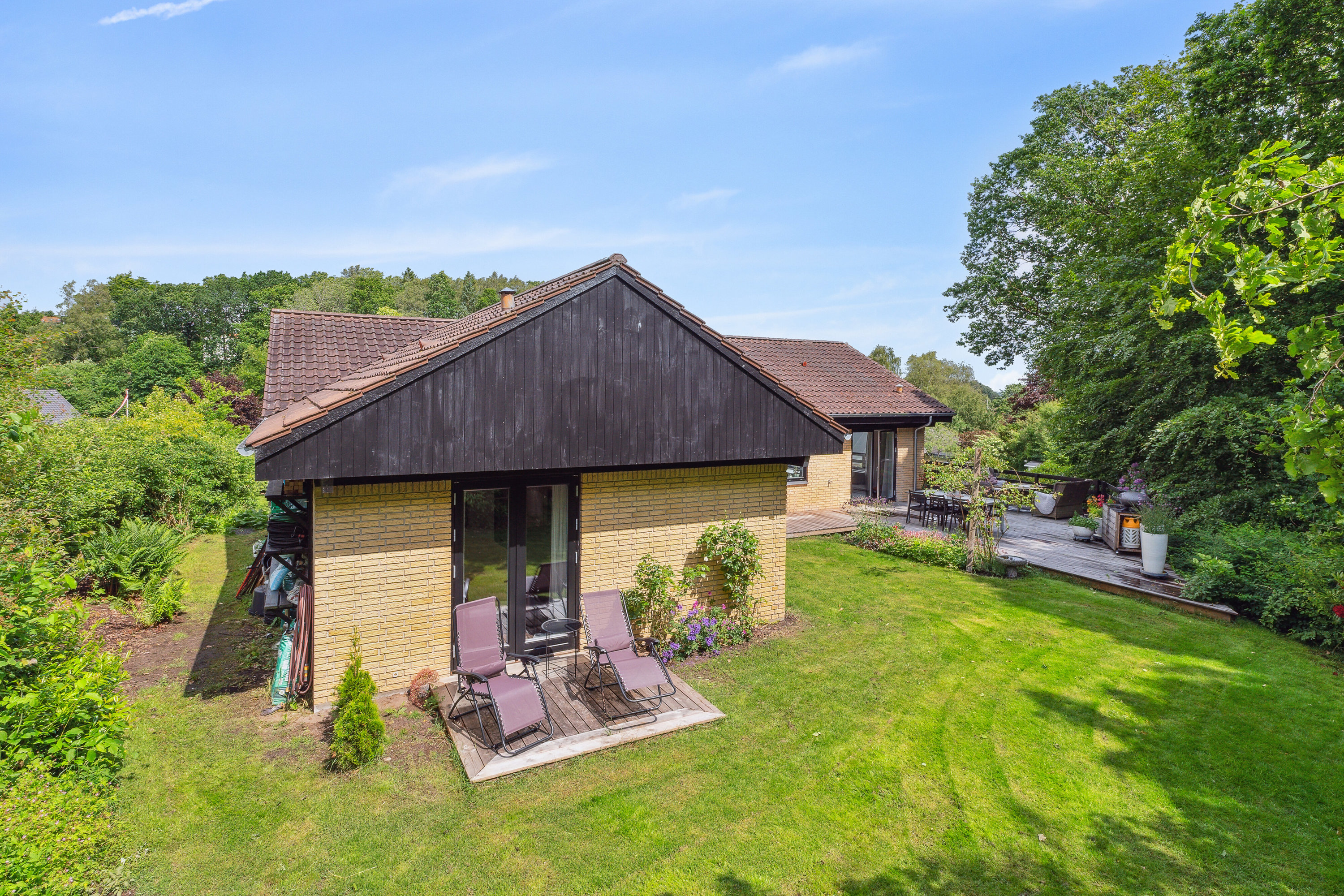 Fremhævet set fra haven billede i fuldskærmstilstand. Billede af Risumvej 41, 8600 Silkeborg