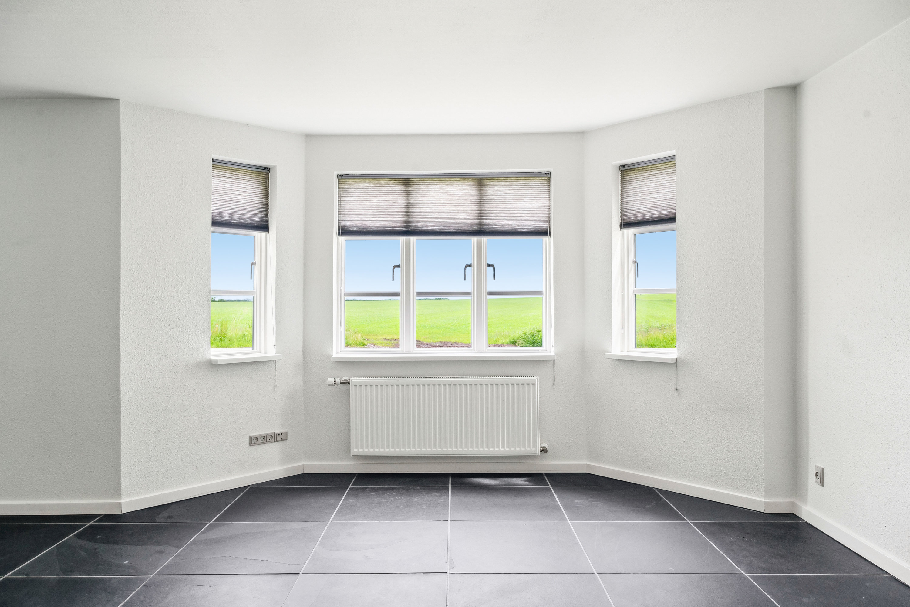 Fremhævet stue billede i fuldskærmstilstand. Billede af Houtvedvej 29, Oue, 9500 Hobro