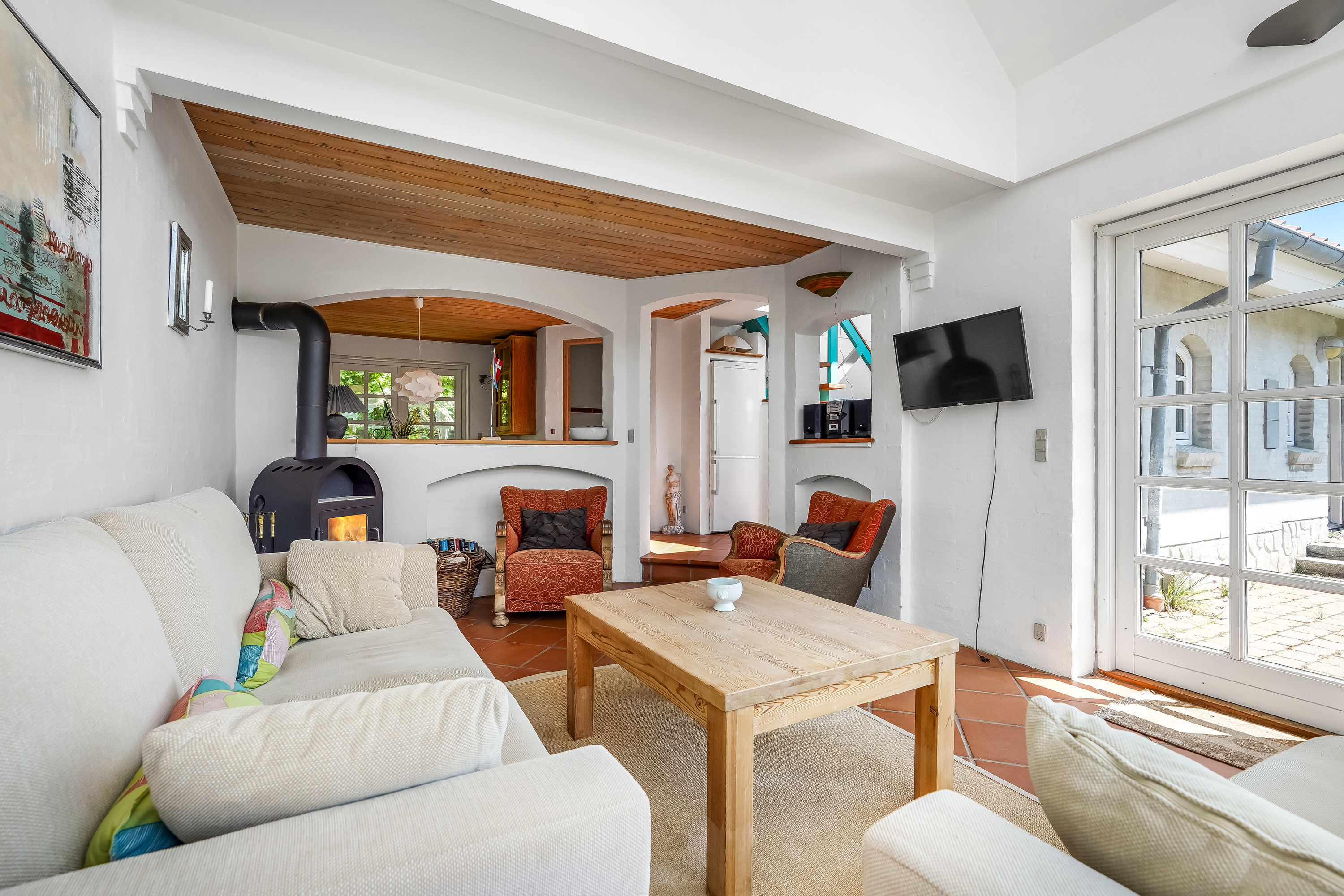 Fremhævet stue billede i fuldskærmstilstand. Billede af Henningsensvej 15, Hasmark Strand, 5450 Otterup