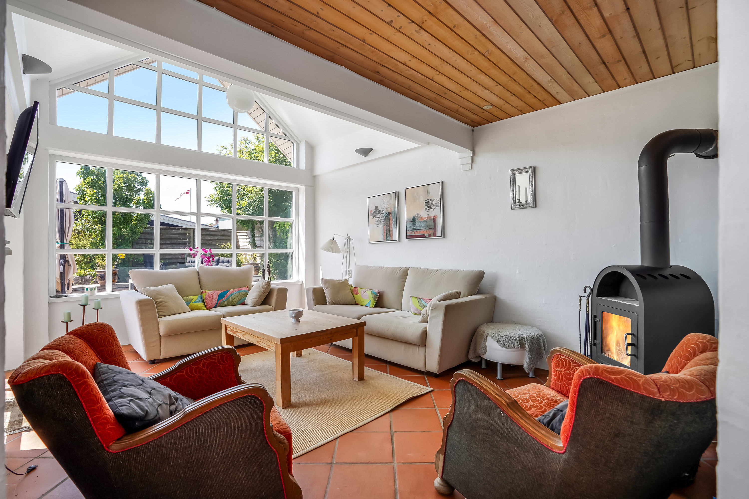 Fremhævet stue billede i fuldskærmstilstand. Billede af Henningsensvej 15, Hasmark Strand, 5450 Otterup