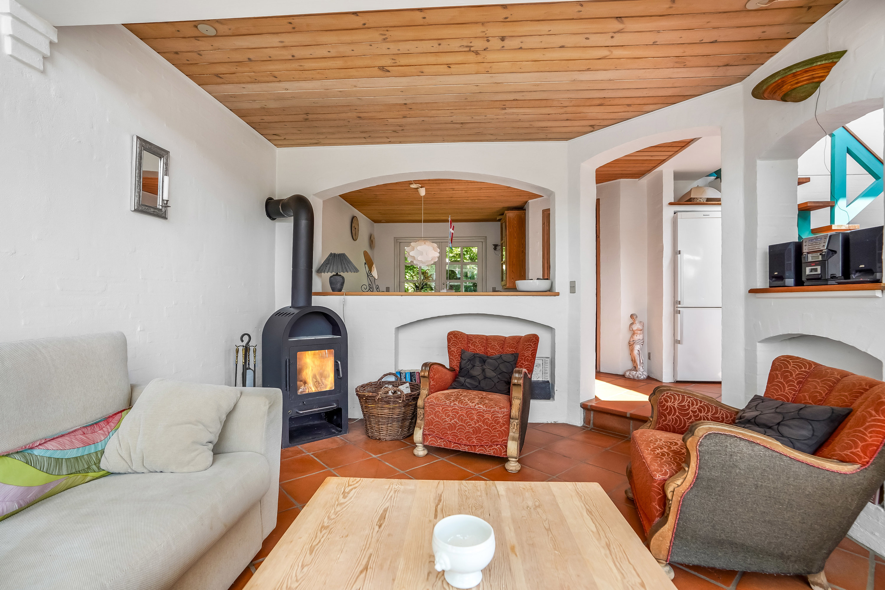 Fremhævet stue billede i fuldskærmstilstand. Billede af Henningsensvej 15, Hasmark Strand, 5450 Otterup