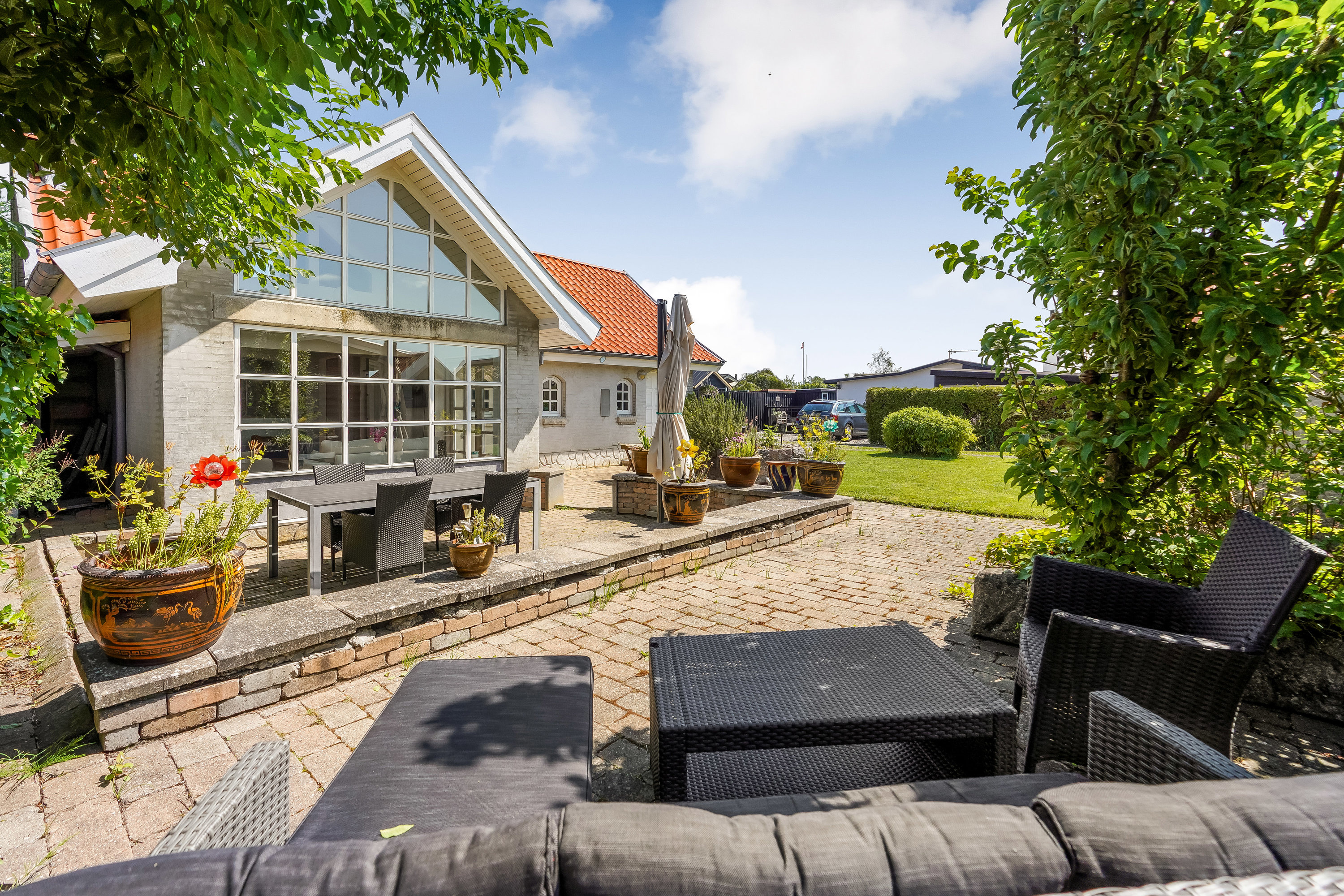 Fremhævet terrasse billede i fuldskærmstilstand. Billede af Henningsensvej 15, Hasmark Strand, 5450 Otterup