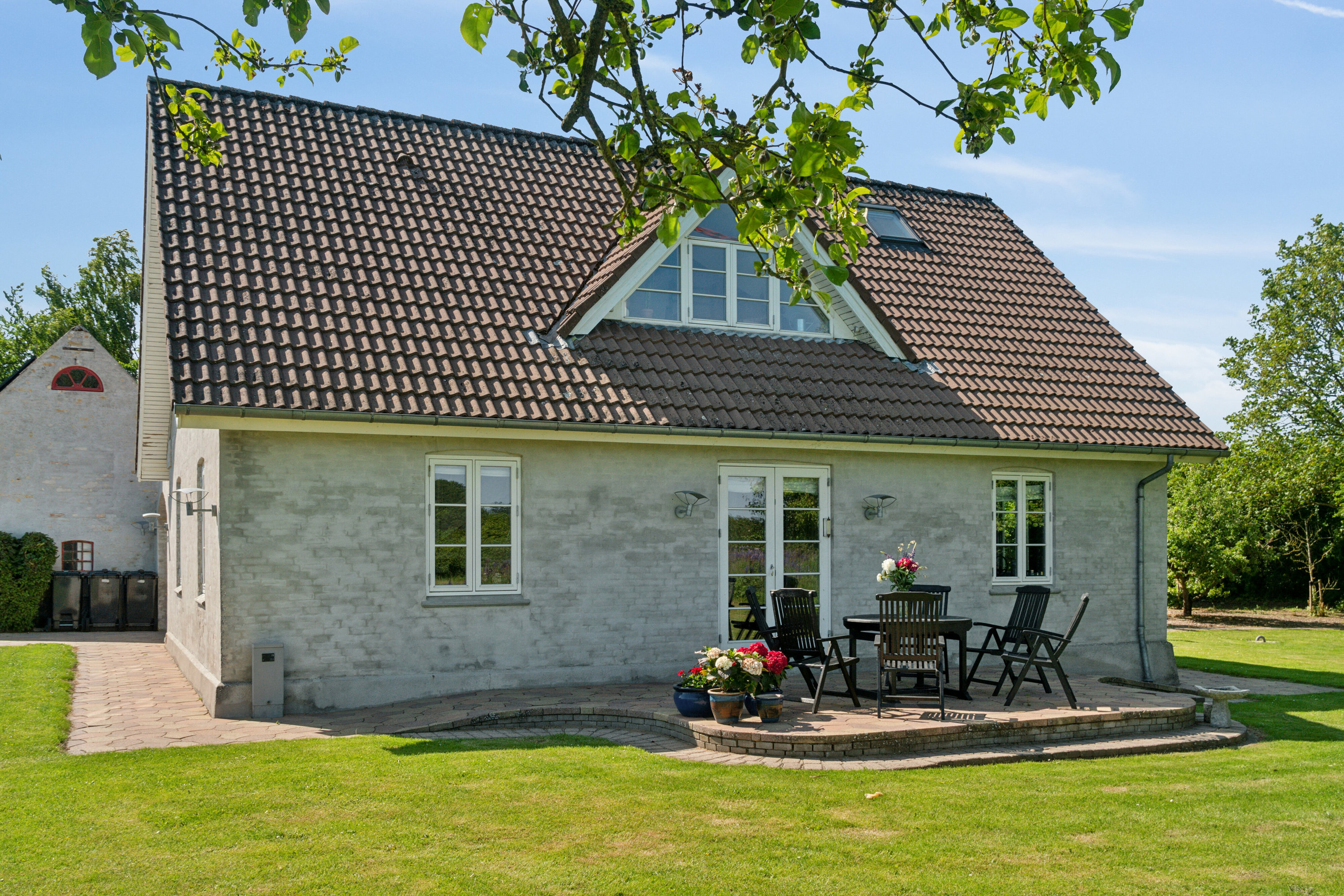 Fremhævet set fra haven billede i fuldskærmstilstand. Billede af Vollerupvej 14, Vollerup, 4200 Slagelse