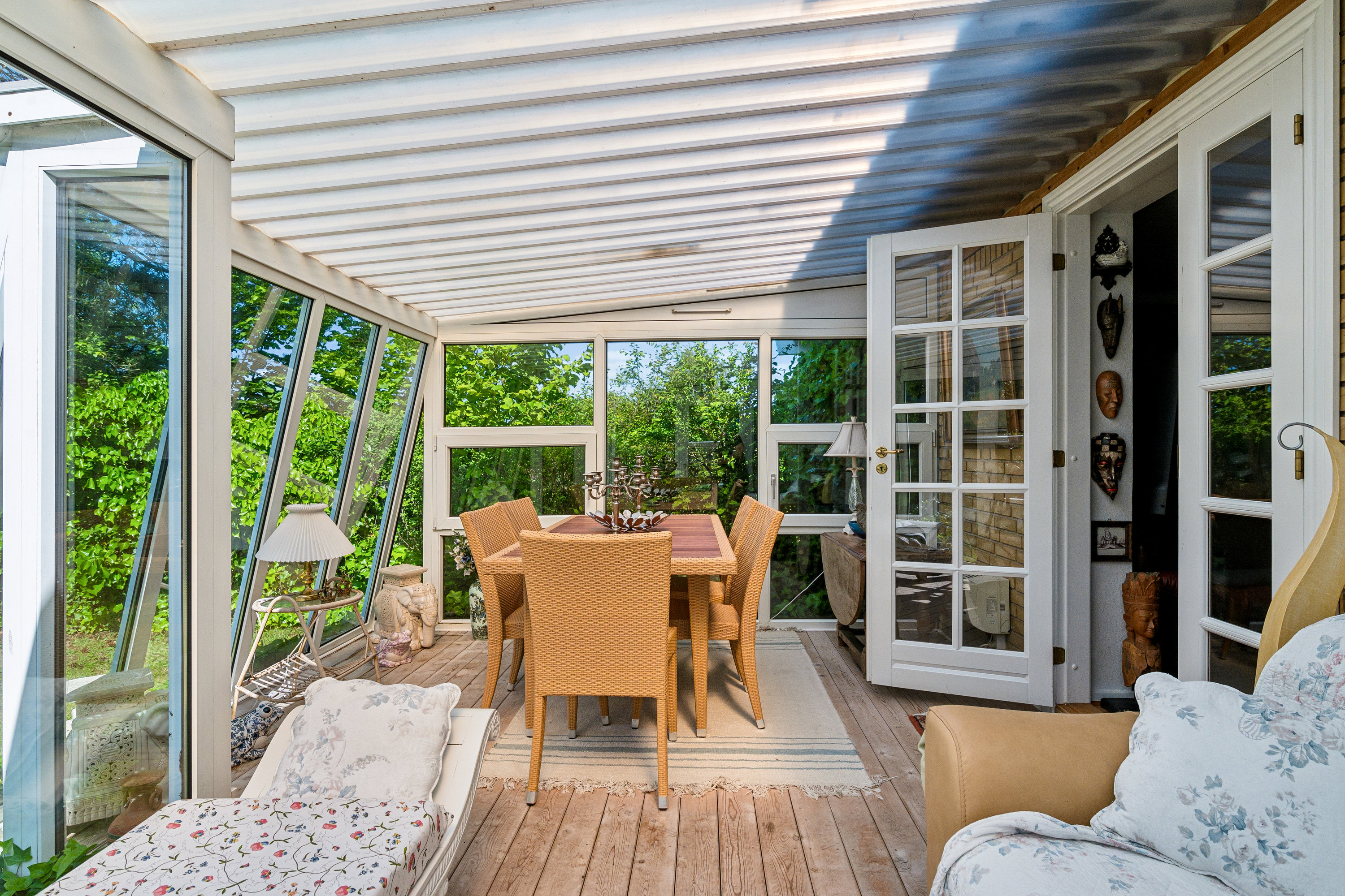 Fremhævet udestue billede i fuldskærmstilstand. Billede af Granvænget 3, 8970 Havndal