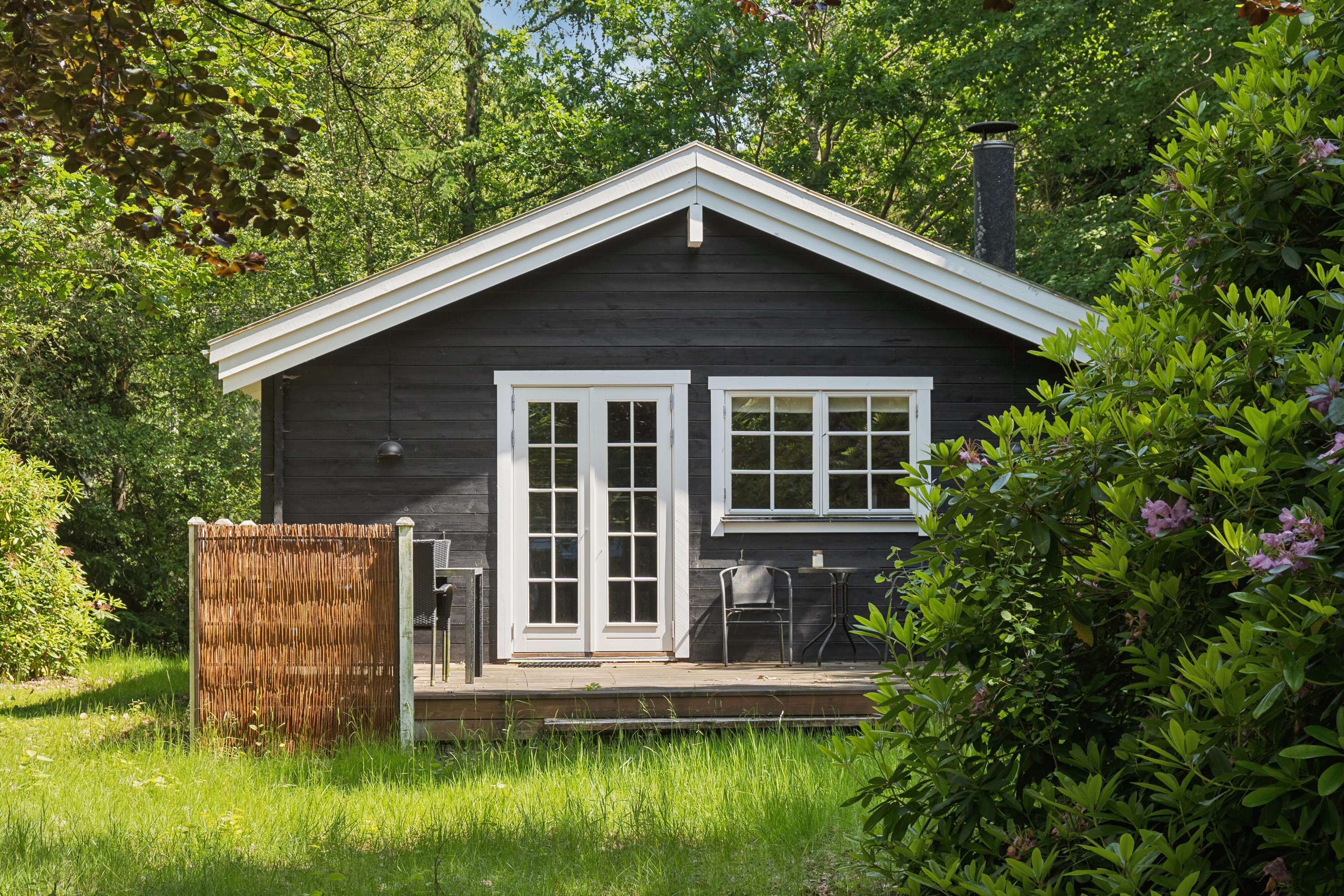 Fremhævet set fra haven billede i fuldskærmstilstand. Billede af Cottageparken 9, 4581 Rørvig