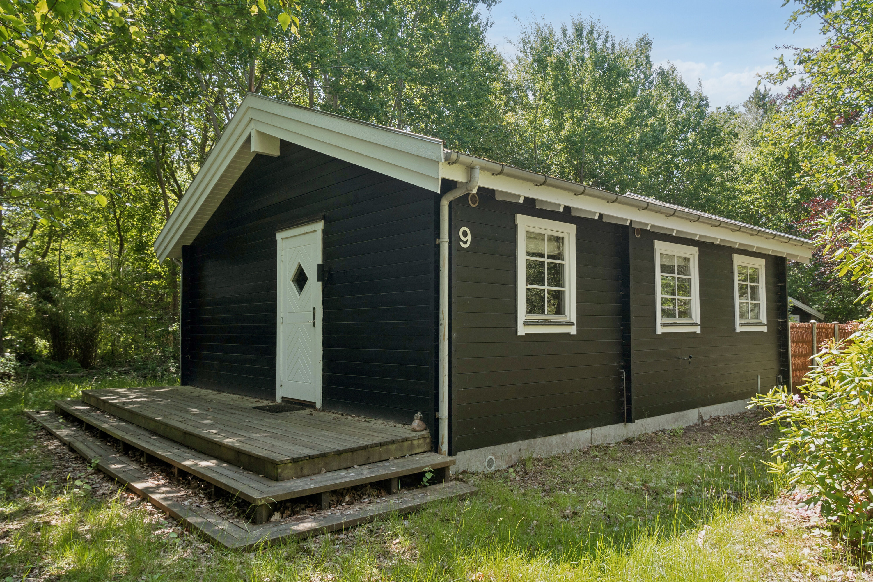 Fremhævet set fra haven billede i fuldskærmstilstand. Billede af Cottageparken 9, 4581 Rørvig