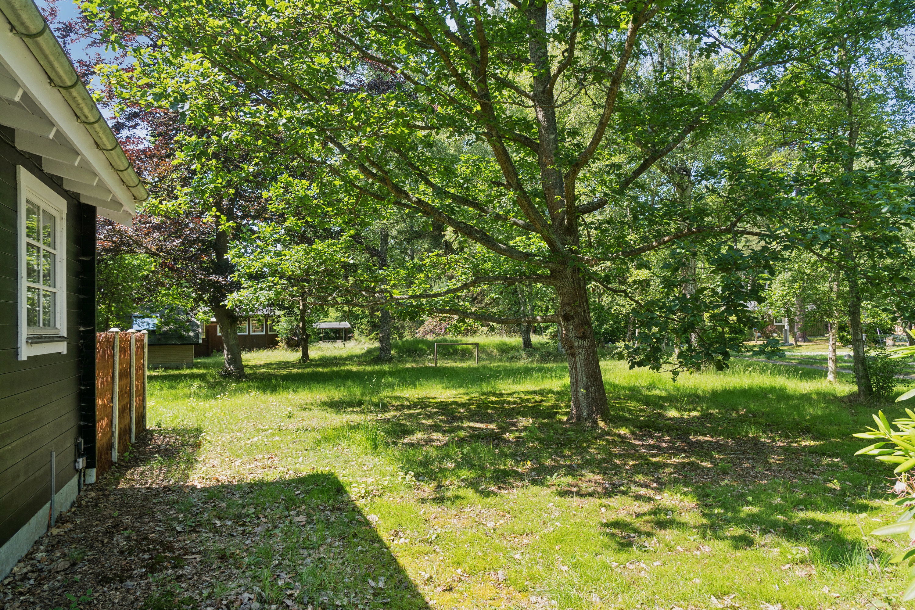 Fremhævet set fra haven billede i fuldskærmstilstand. Billede af Cottageparken 9, 4581 Rørvig
