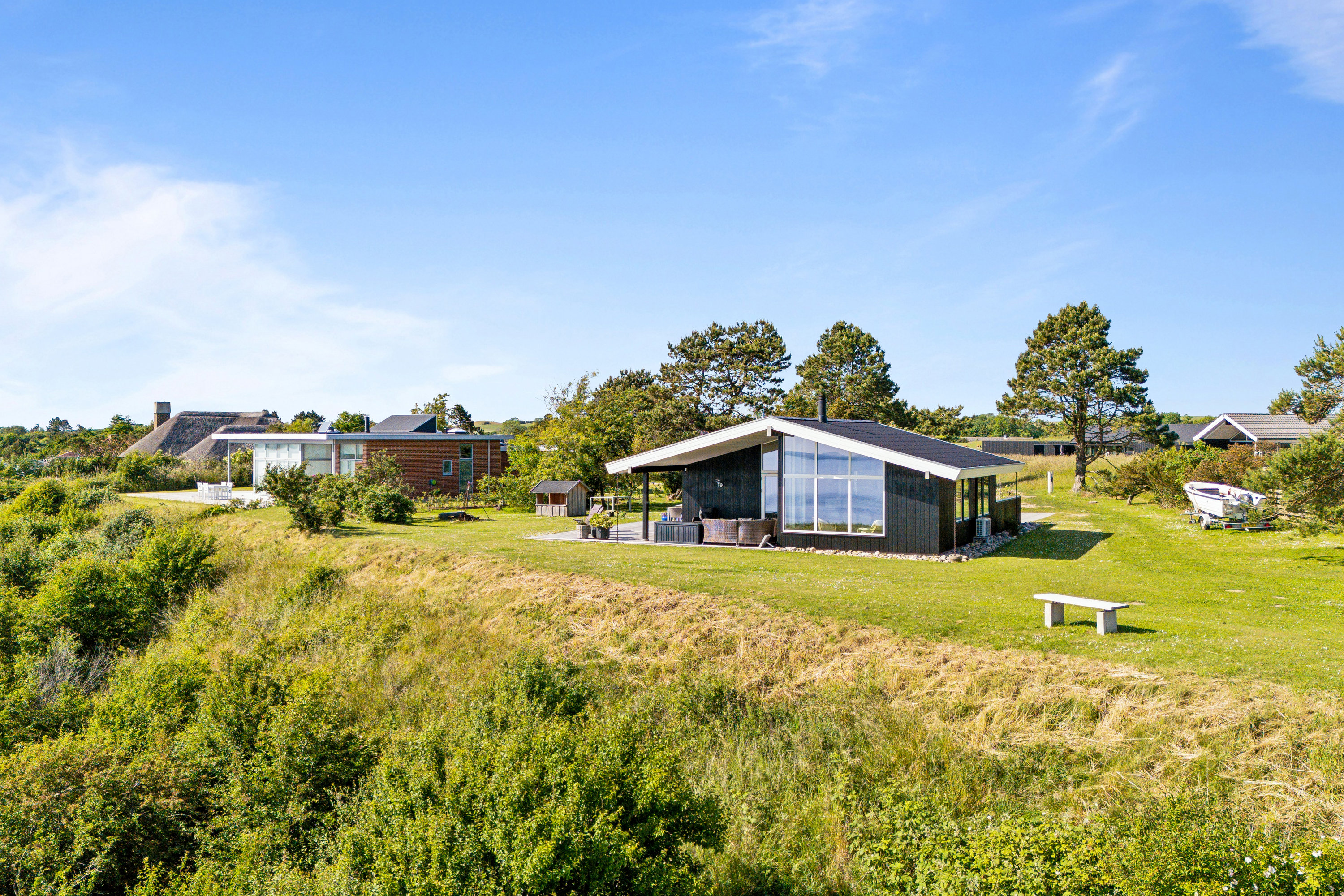 Fremhævet ejendom 1 billede i fuldskærmstilstand. Billede af Skråningen 42, Strands, 8420 Knebel